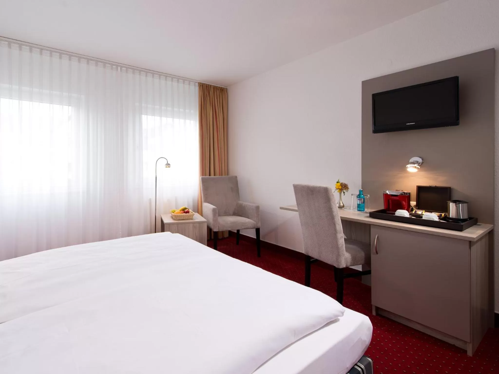 Photo of the whole room, Bed in ACHAT Hotel Frankenthal in der Pfalz