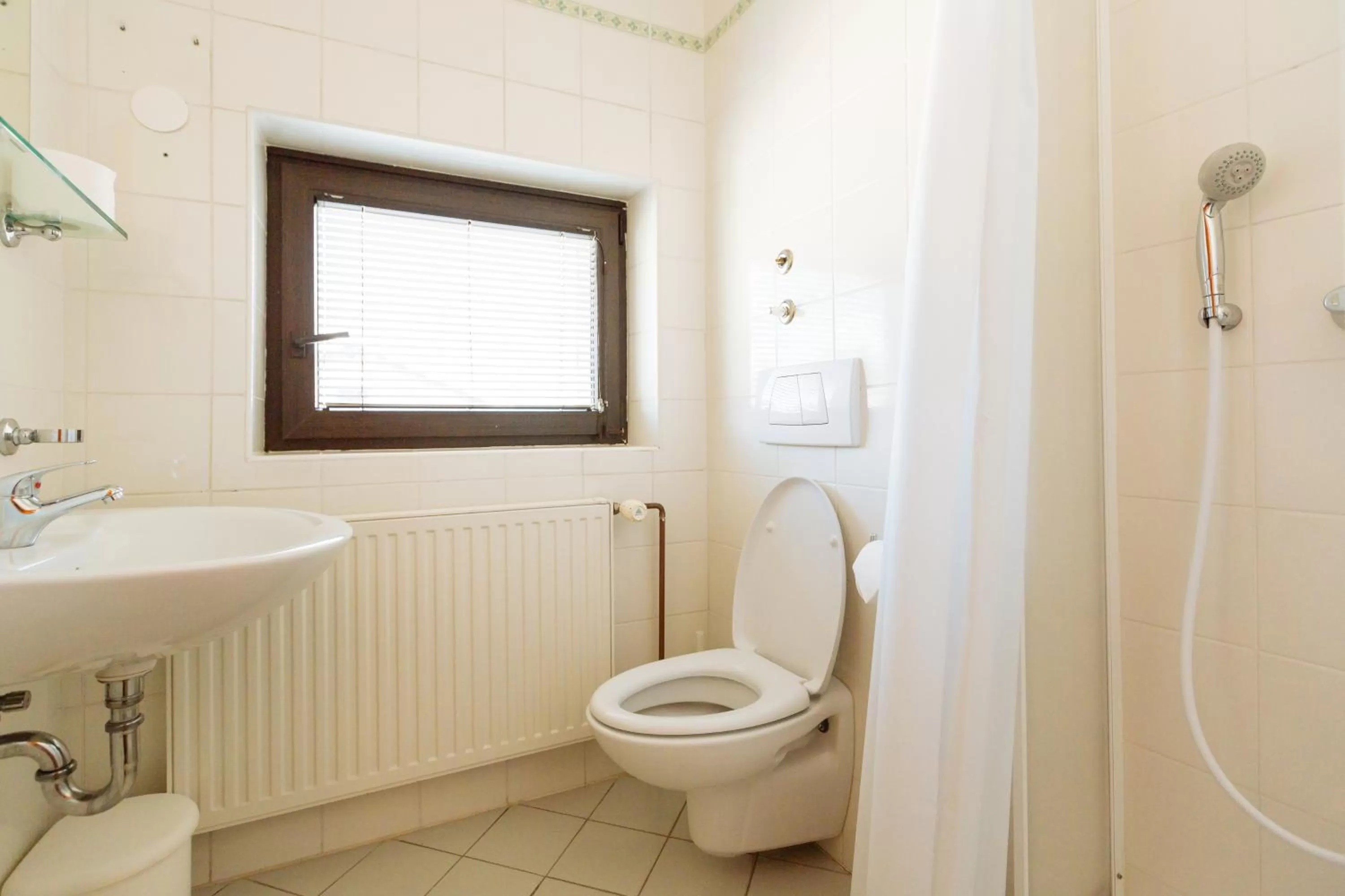 Bathroom in Hotel GH Kolinska