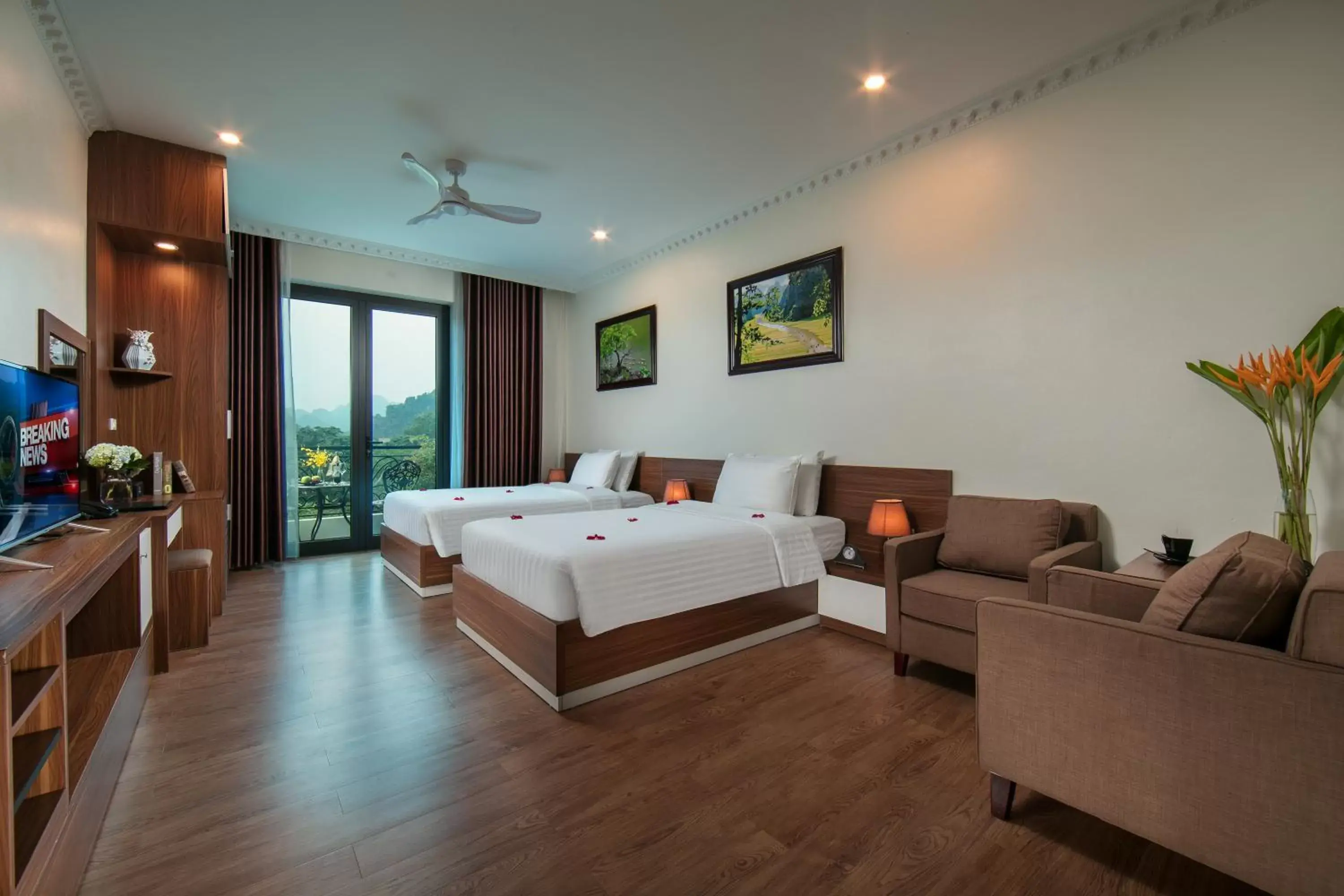 Deluxe Twin Room with Balcony and Mountain View in Tam Coc Holiday Hotel & Villa Deluxe Twin Room with Balcony and Mountain View in Tam Coc Holiday Hotel & Villa
