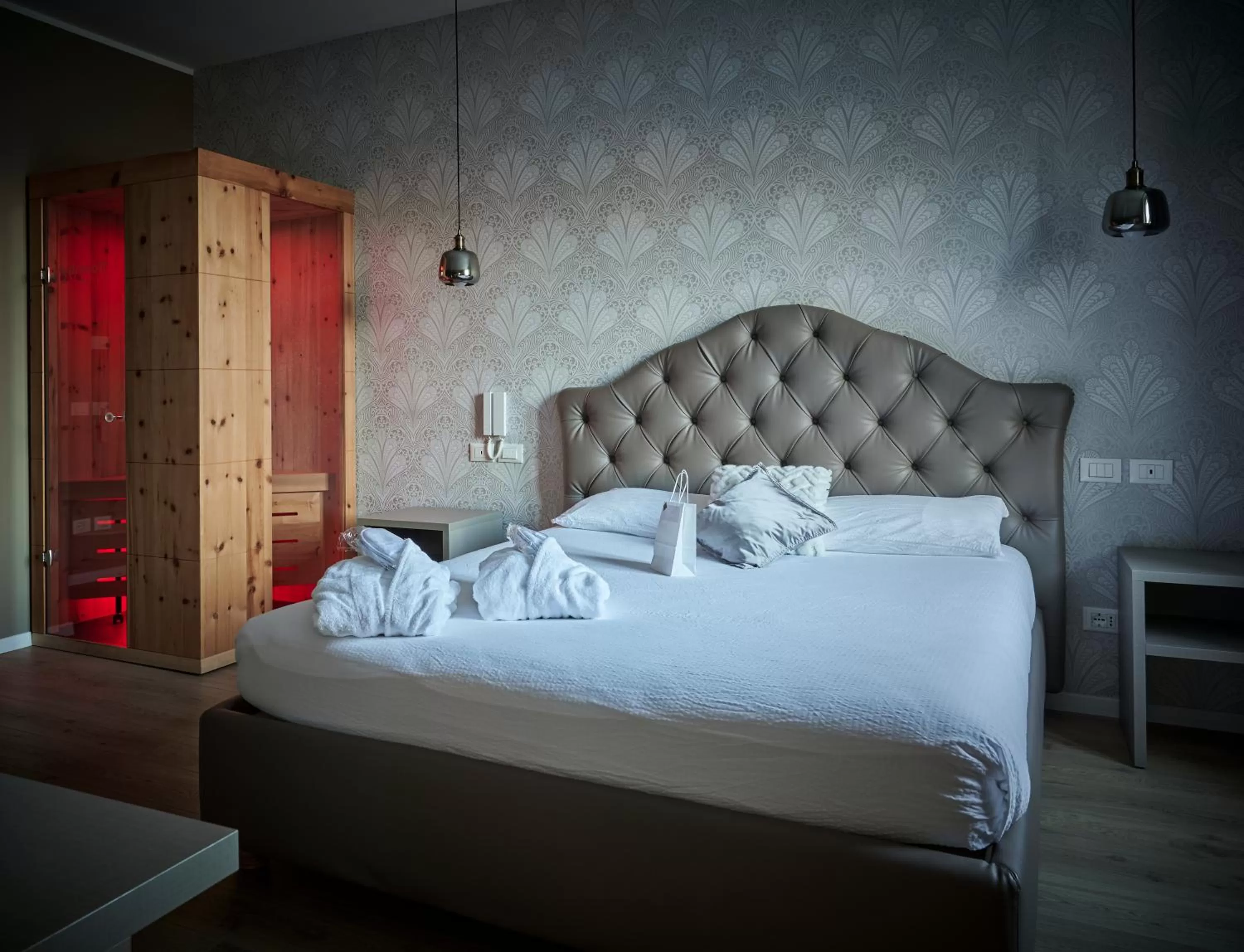 Bed in Lainez Rooms & Suites