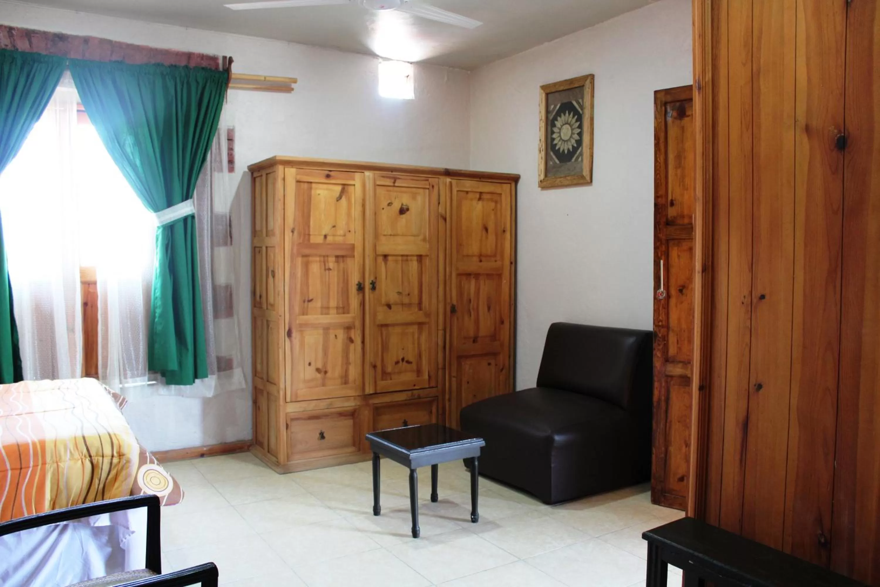 Seating area, Bed in Hotel Vitorina
