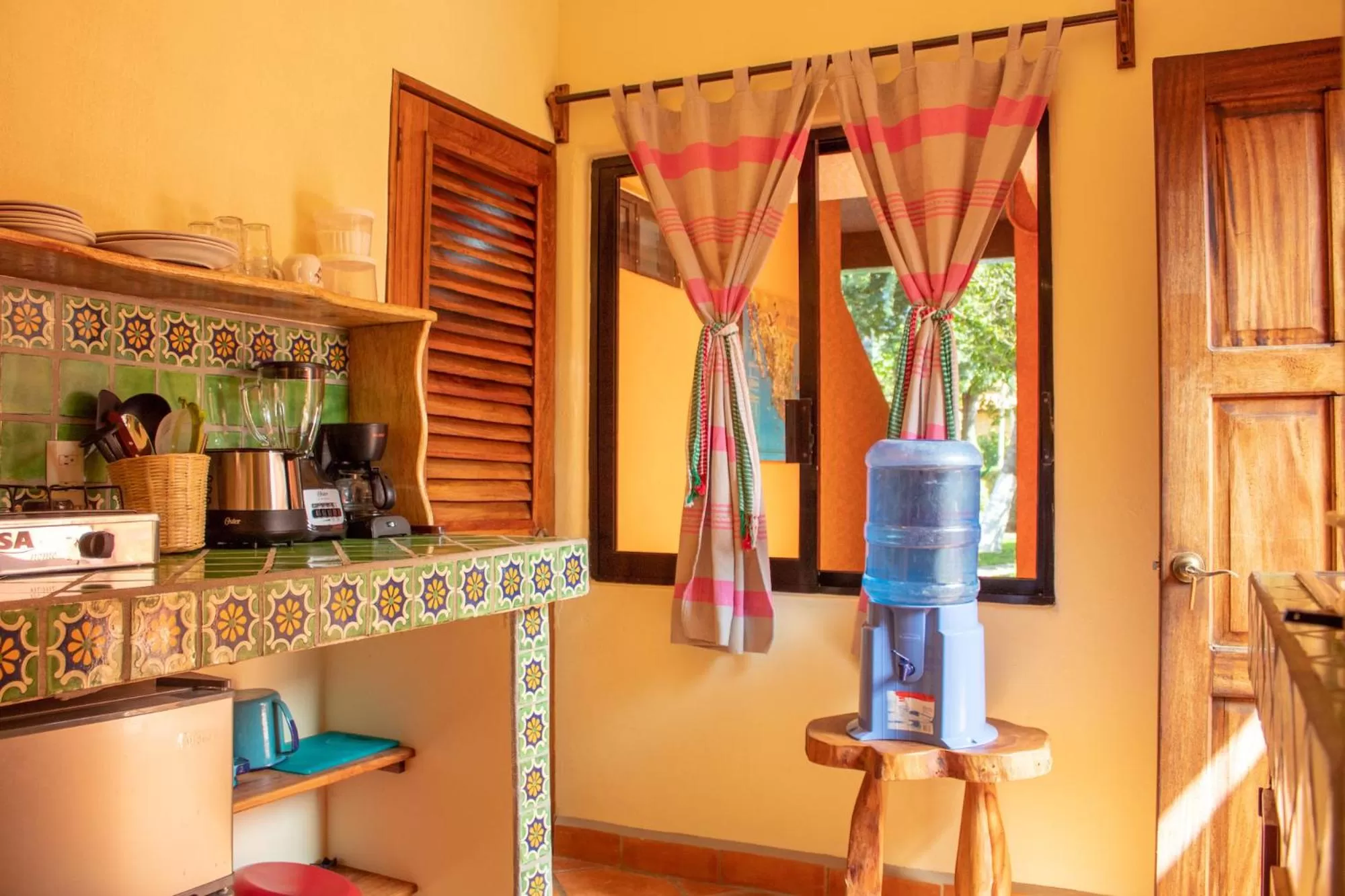 kitchen in Hotel Casamar Suites