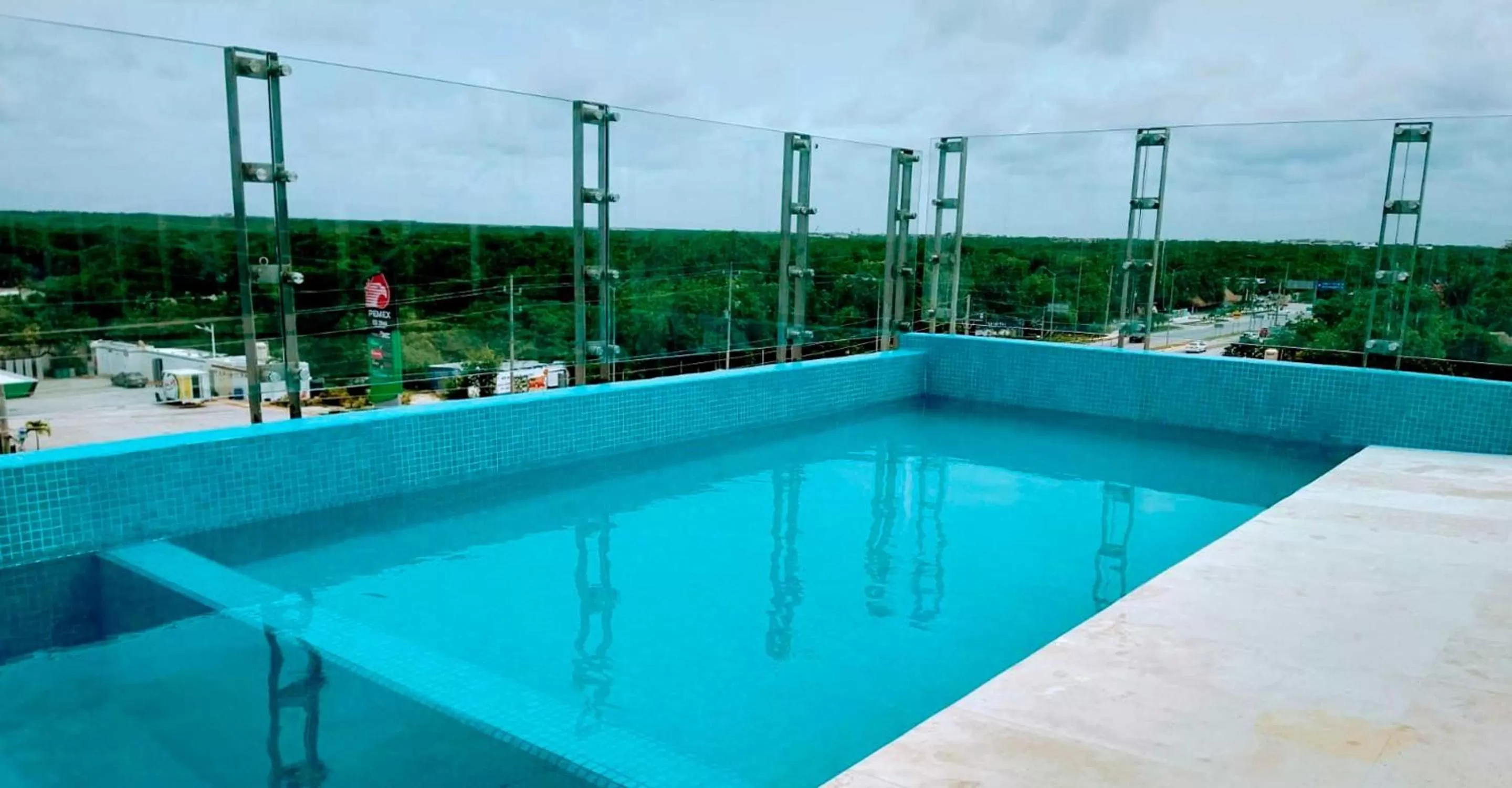 Swimming pool in Siente Tulum Hotel & Cenote Club