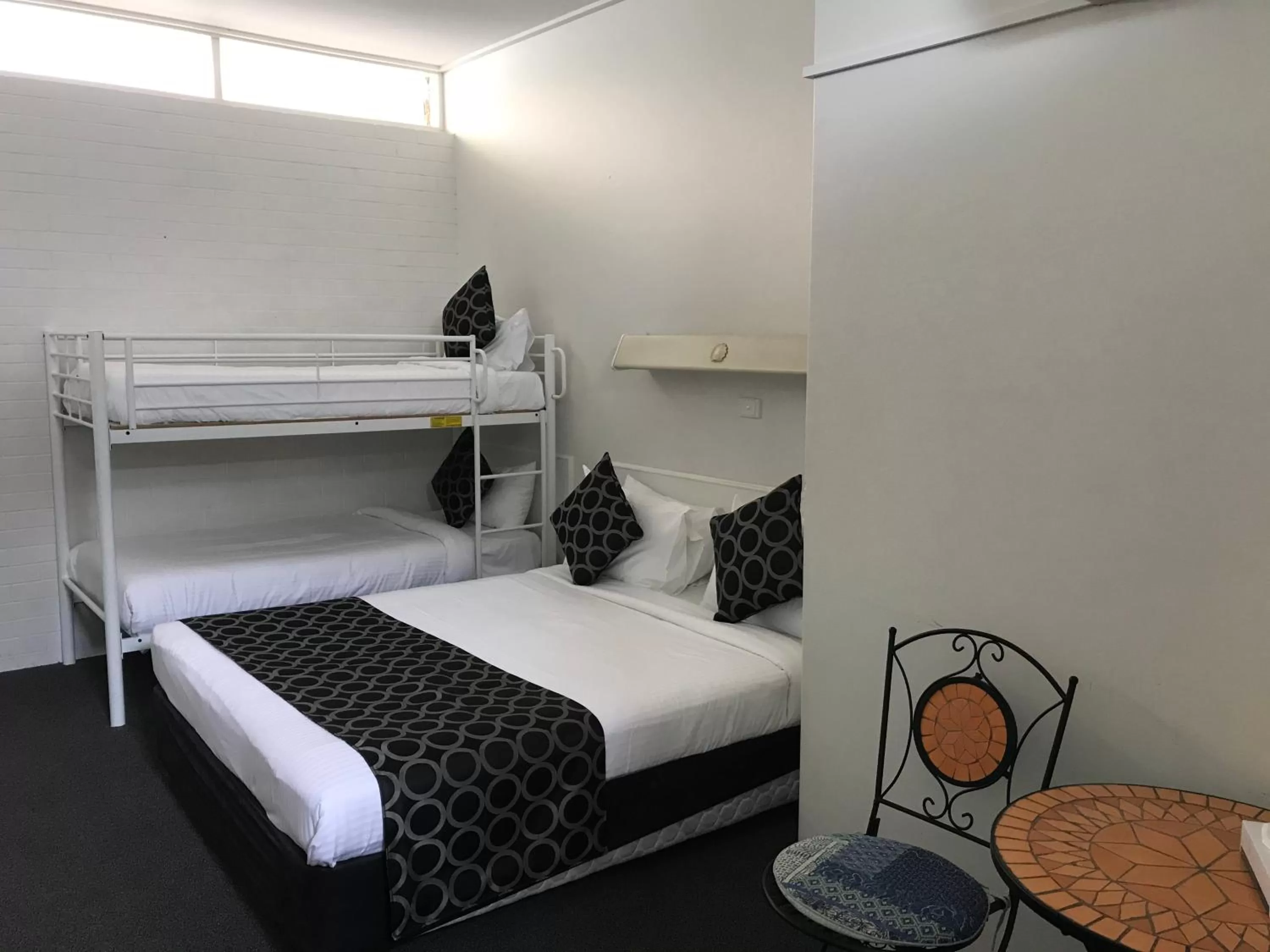 Bed in Coffs Shearwater Motel