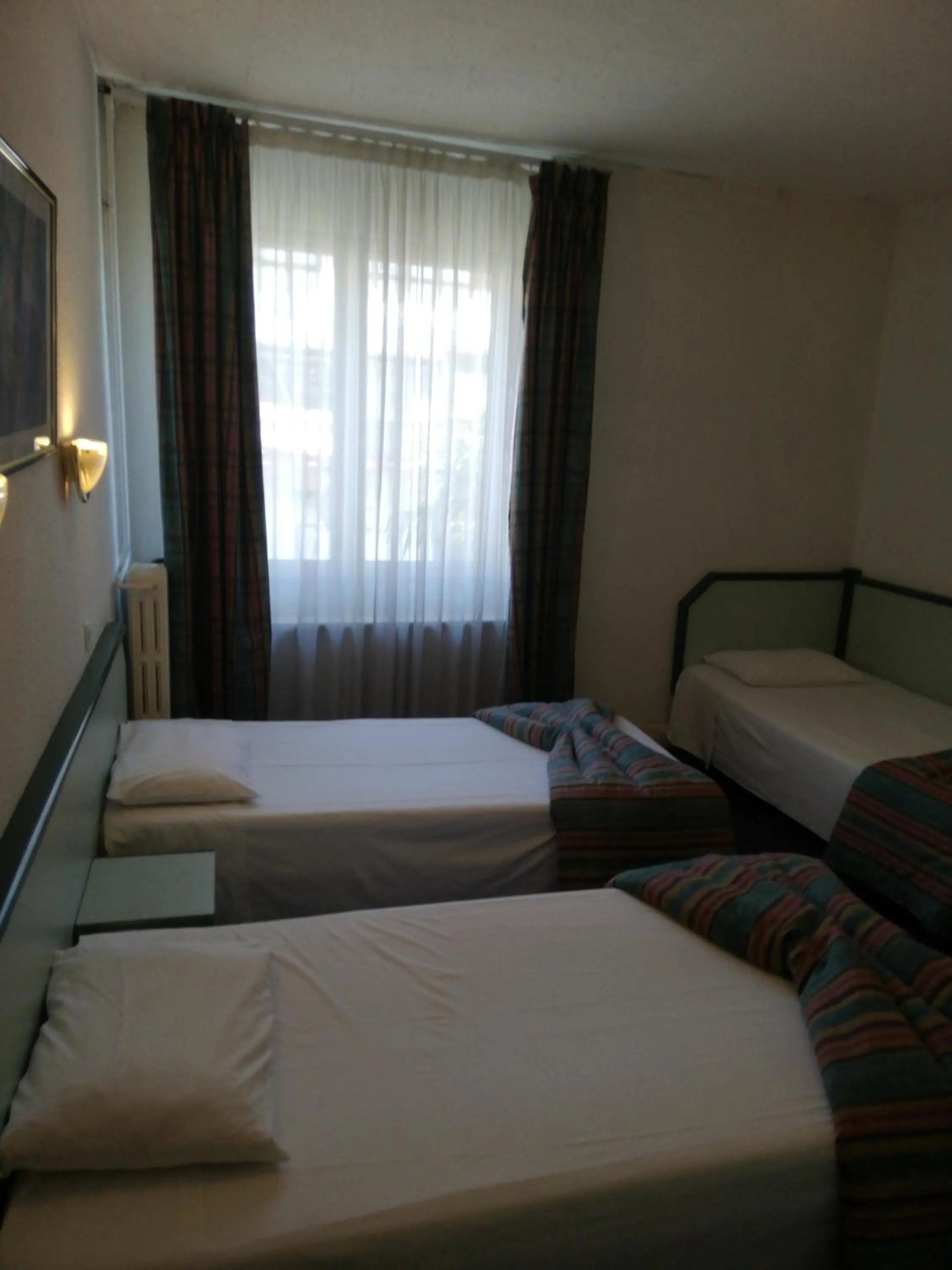 Bed in Hôtel de Nevers