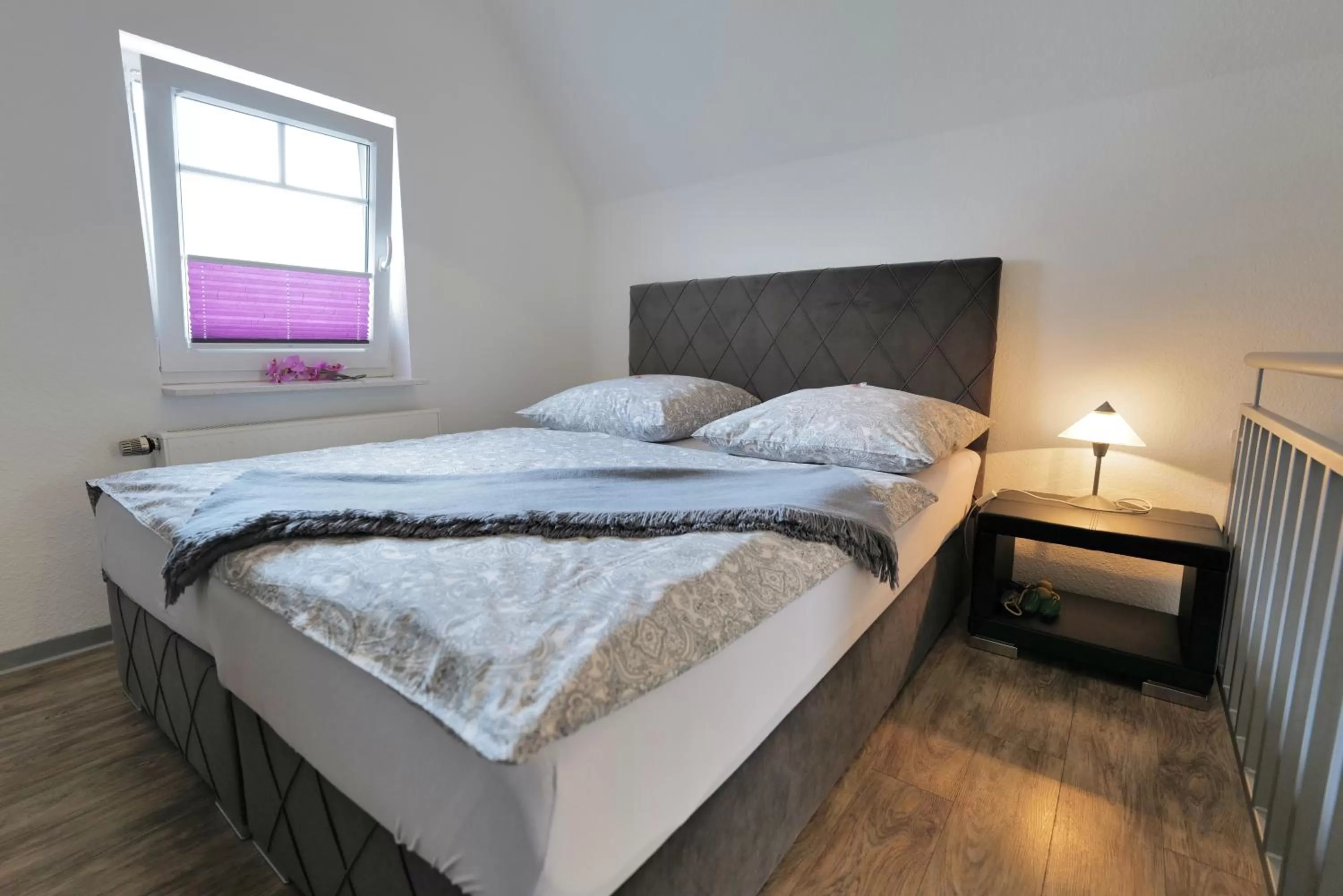 Bed in Elena Kempf Haaratelier & Guesthouse