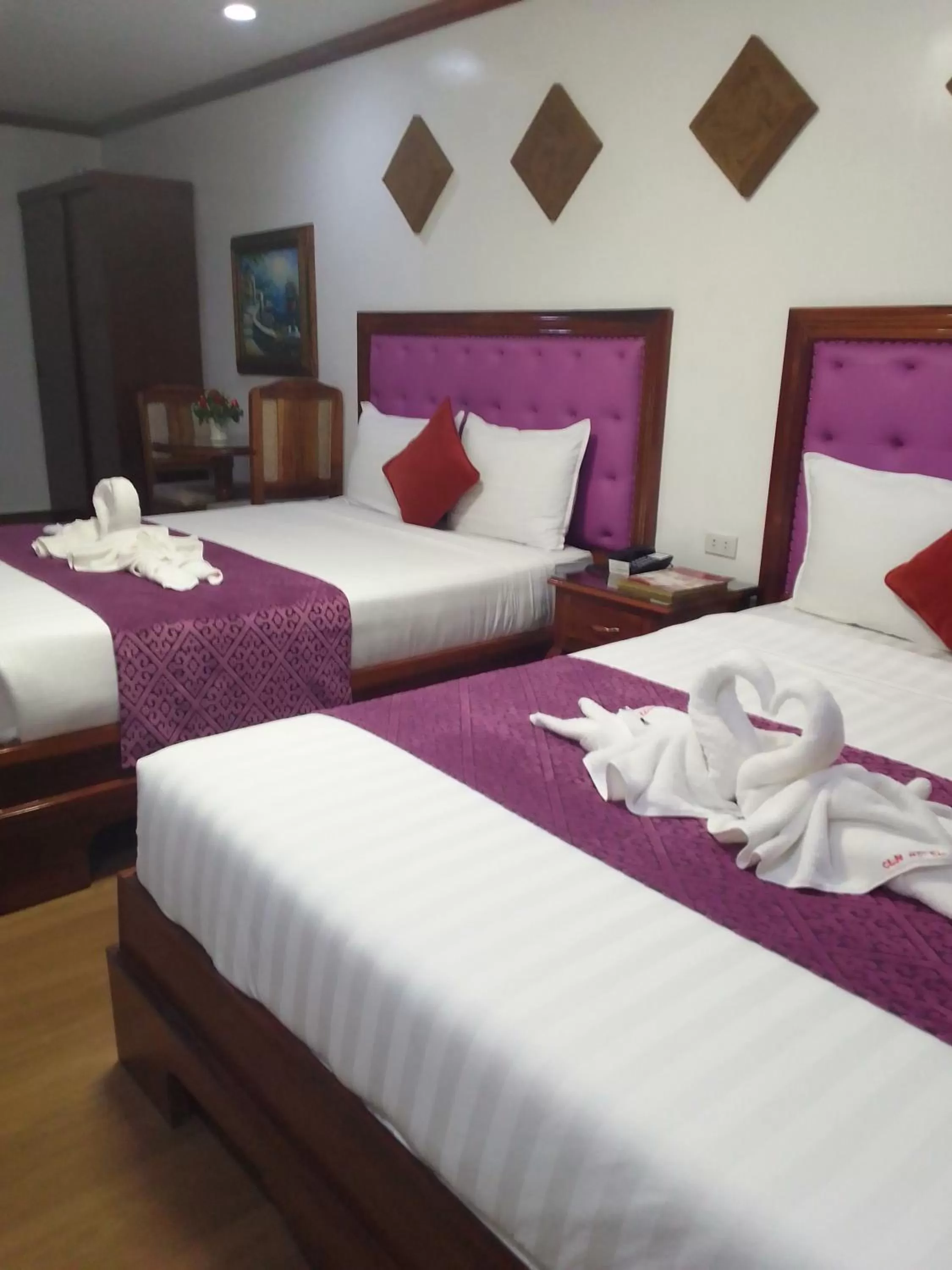 Bed in CLN Boutique Hotel