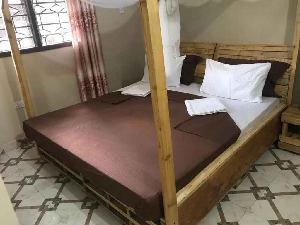 Bed in L&J Modern Backpackers Kinondoni