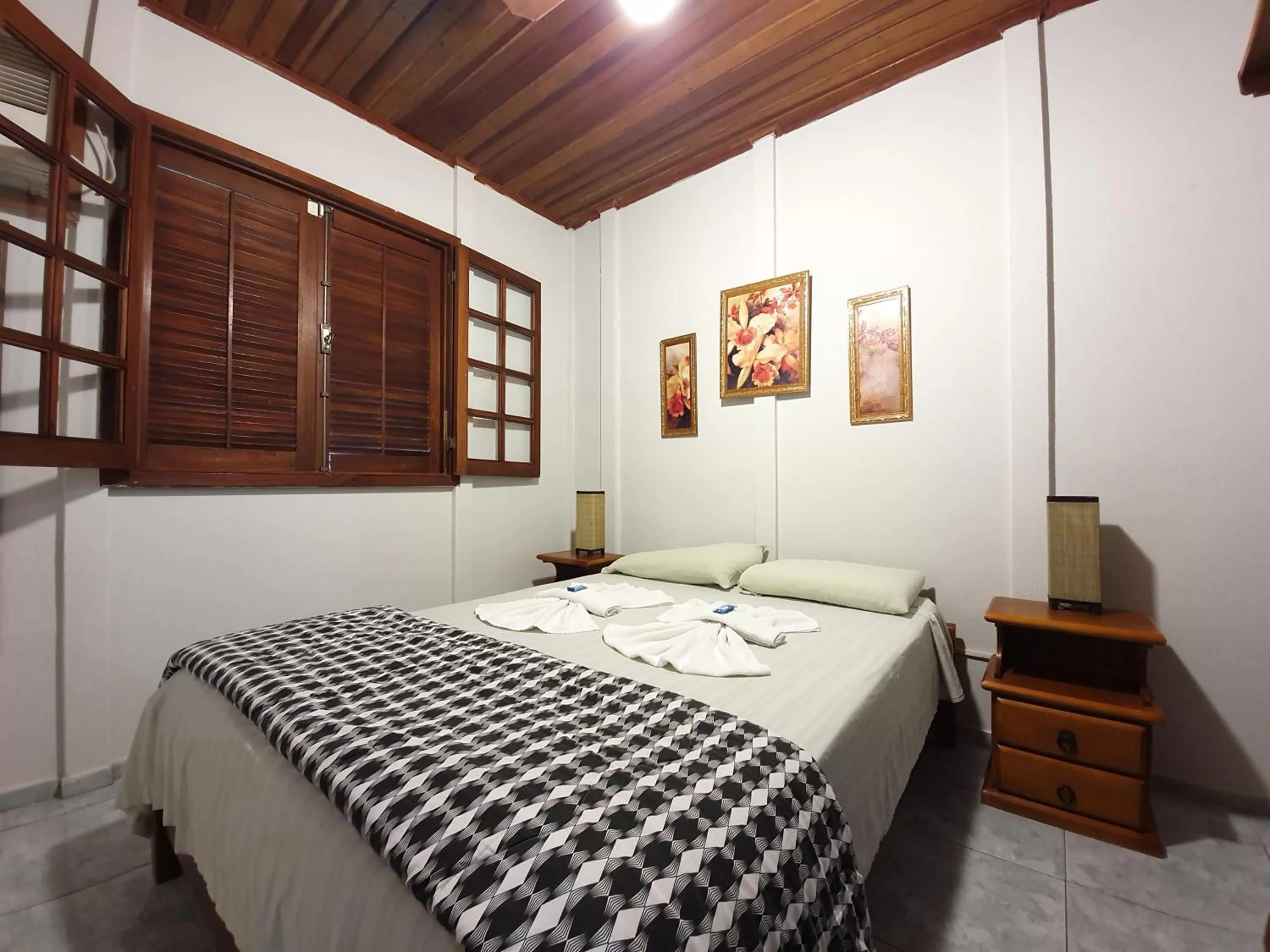 Bed in Pousada Canto do Curió Paraty