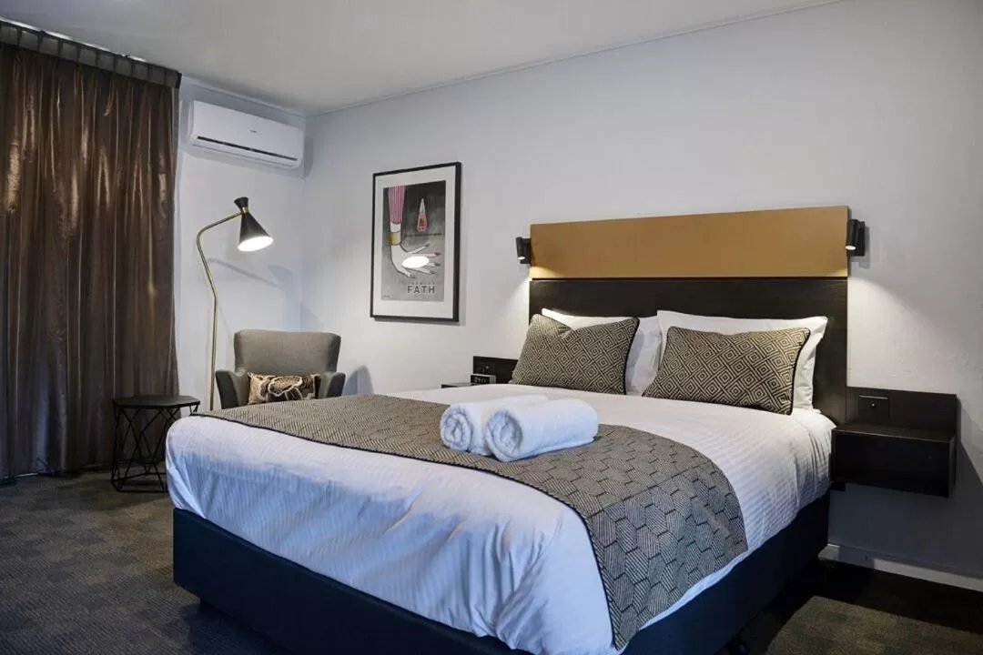 Decorative detail, Bed in CBD Motor Inn