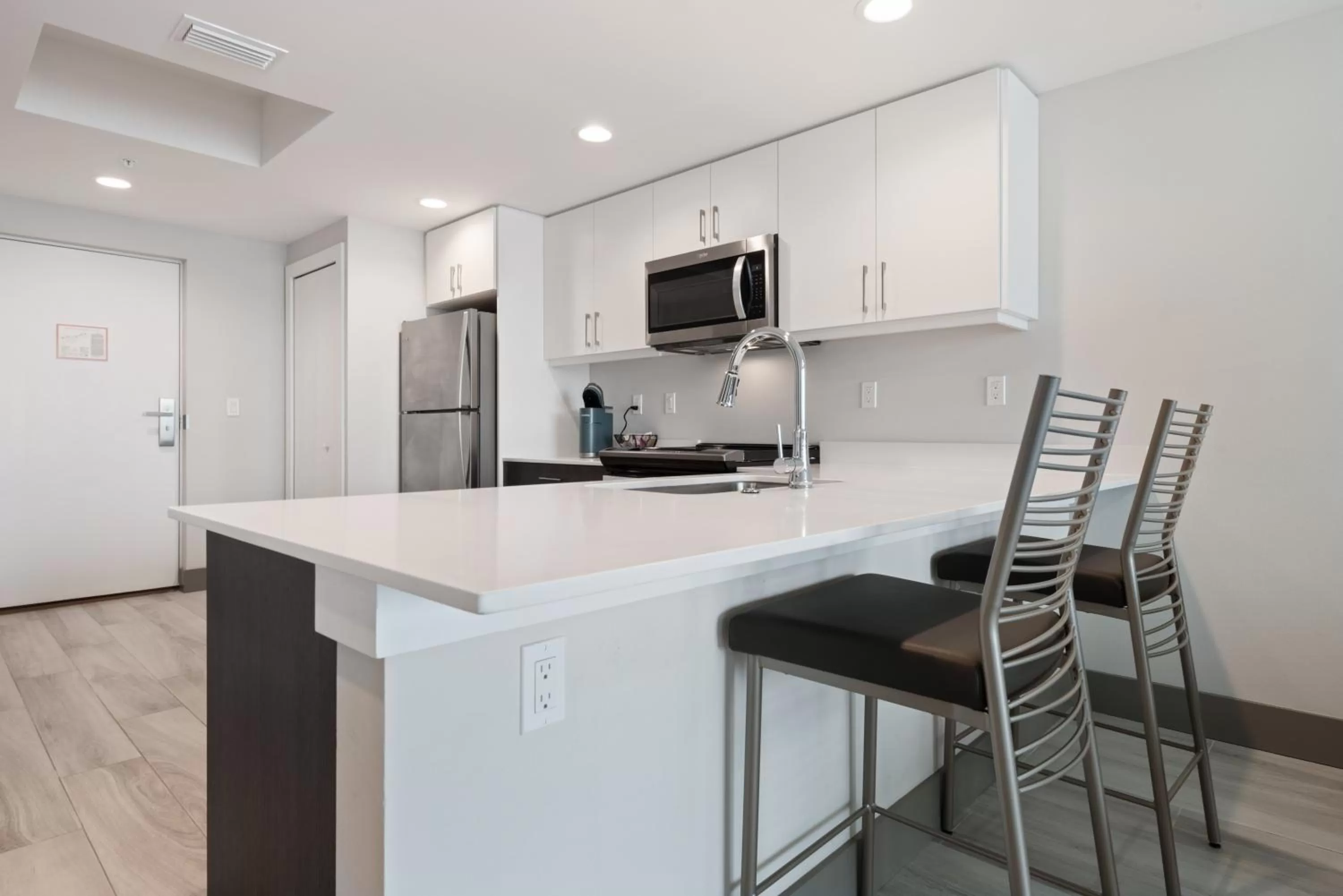 Kitchen or kitchenette in FUSION Resort Waterfront Suites