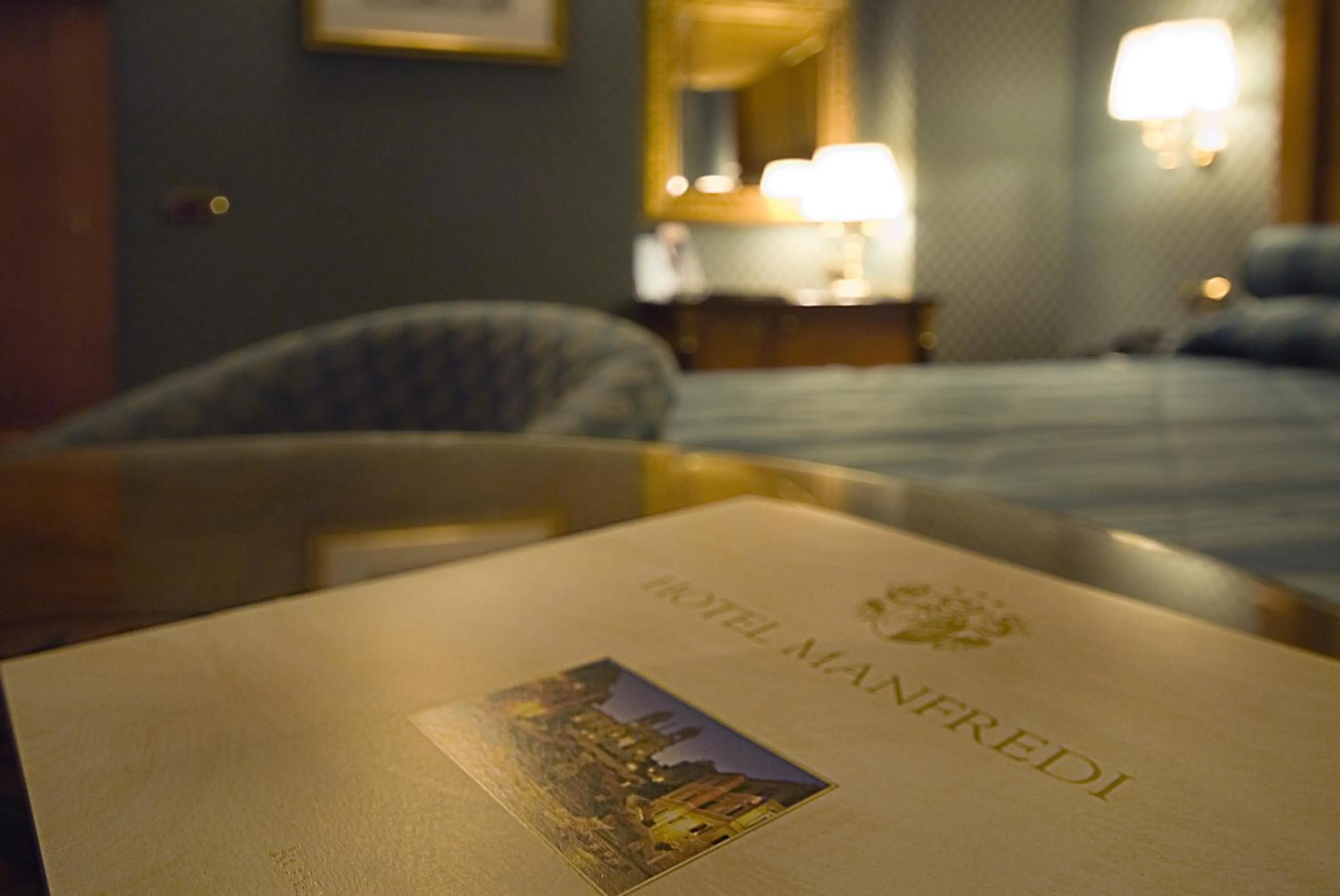Decorative detail, Bed in Hotel Manfredi Suite In Rome