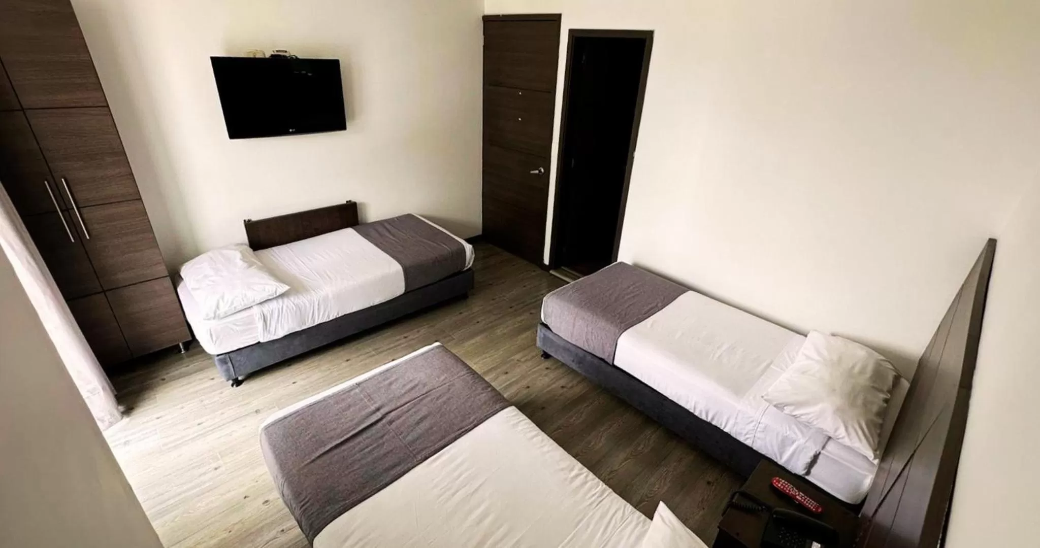 Bed in Hotel Expo Hotel Ferial