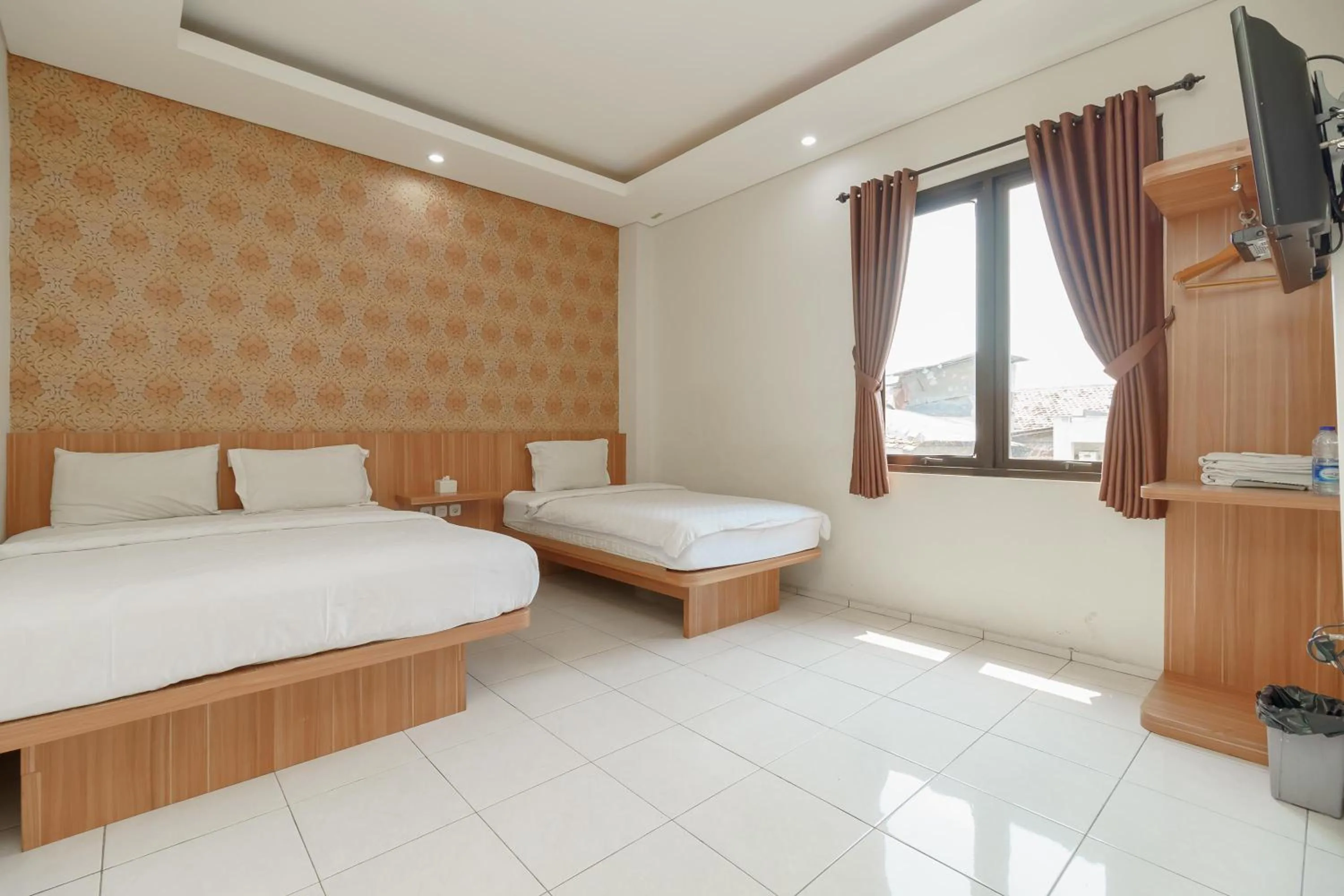 Bed in Green Apple Residence near Sarinah Mitra RedDoorz