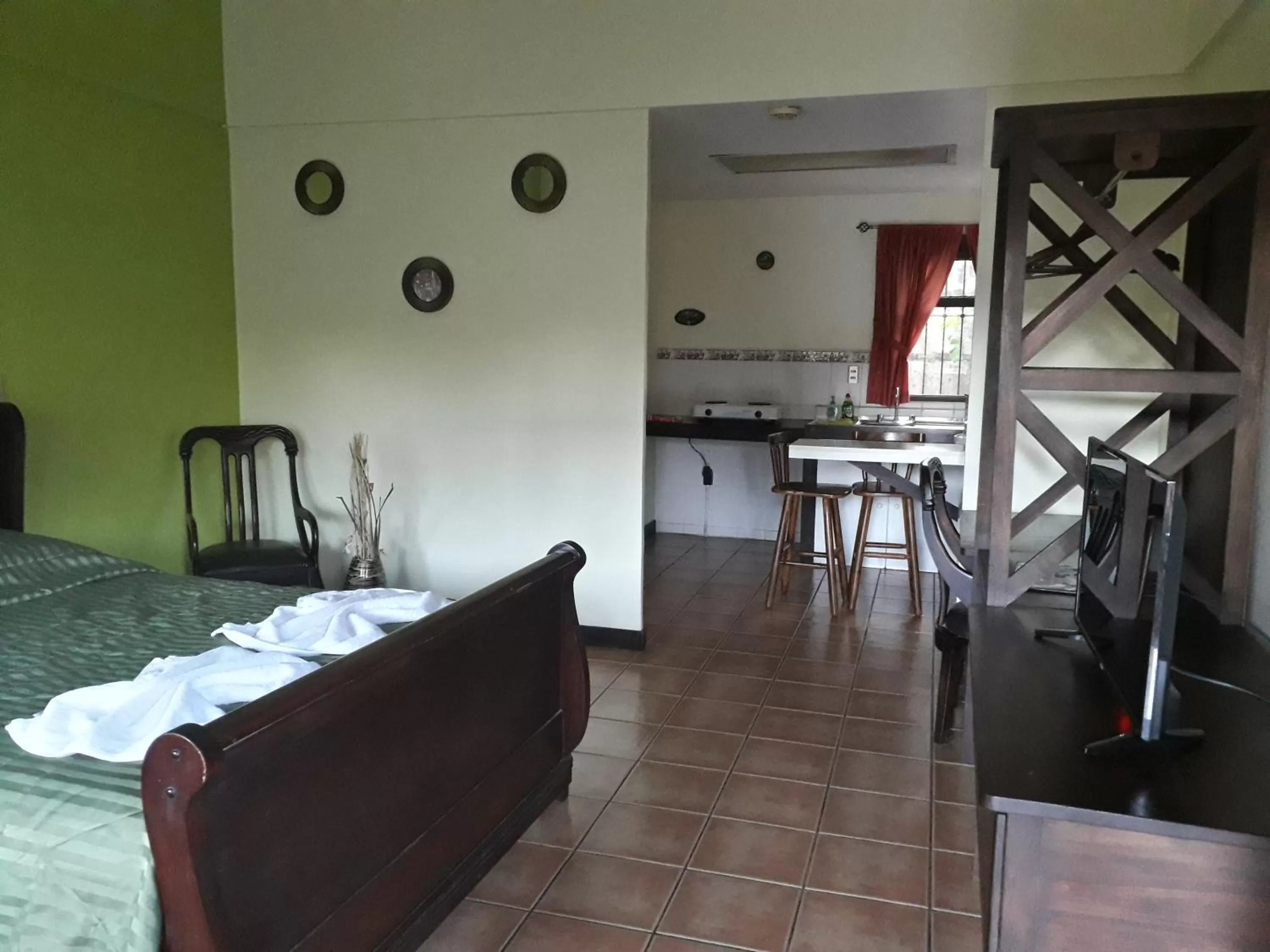 Bed in Dos Palmas Studio Apartments