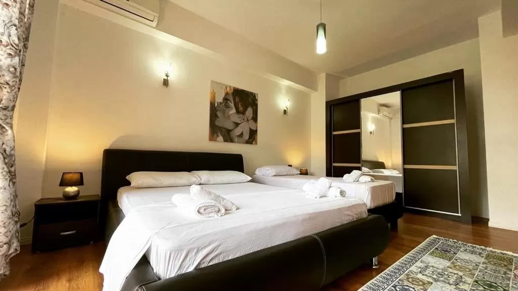 Bed in Hotel Ambasador Garden