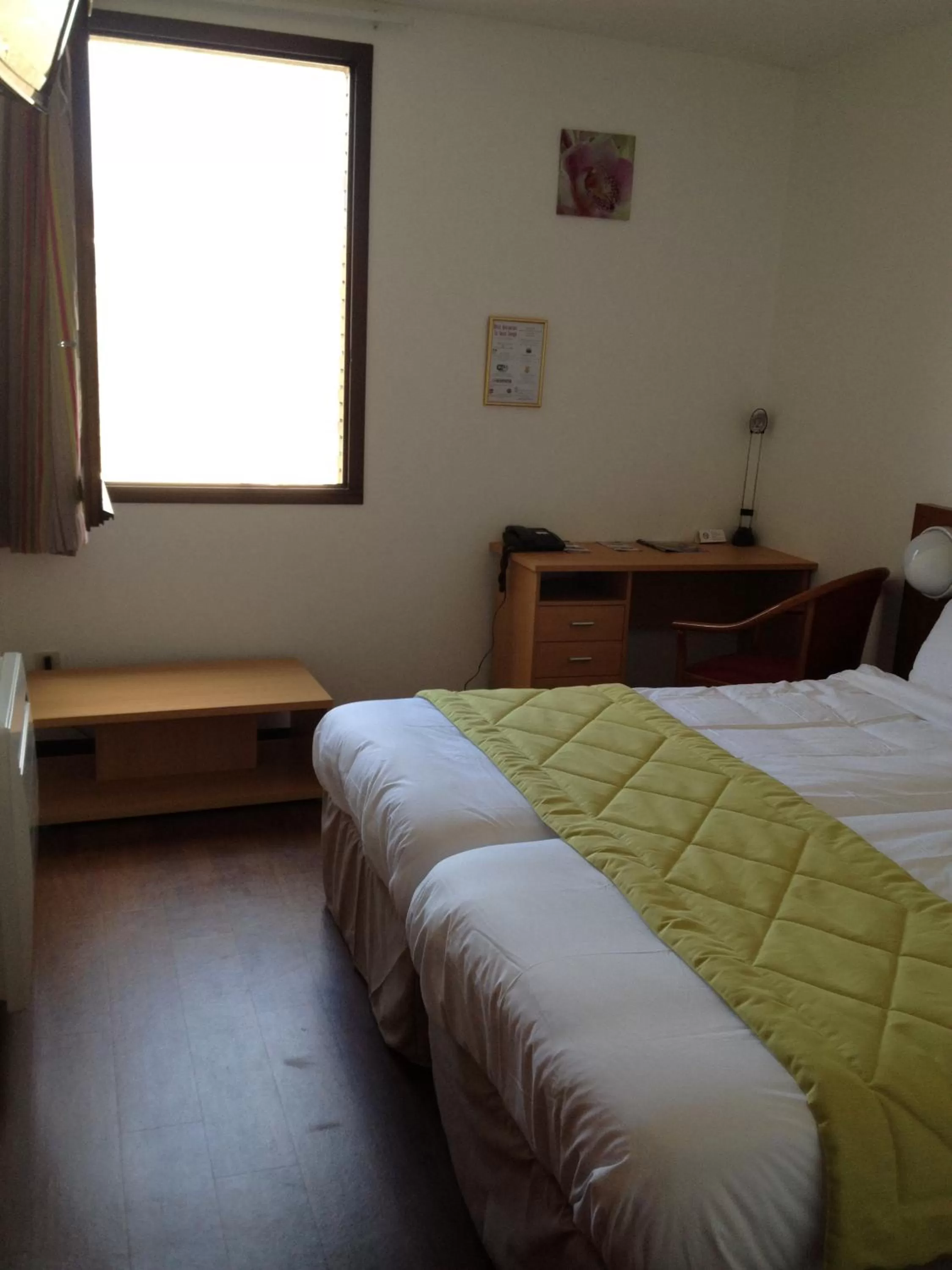 Photo of the whole room, Bed in Hôtel Le Saint Joseph