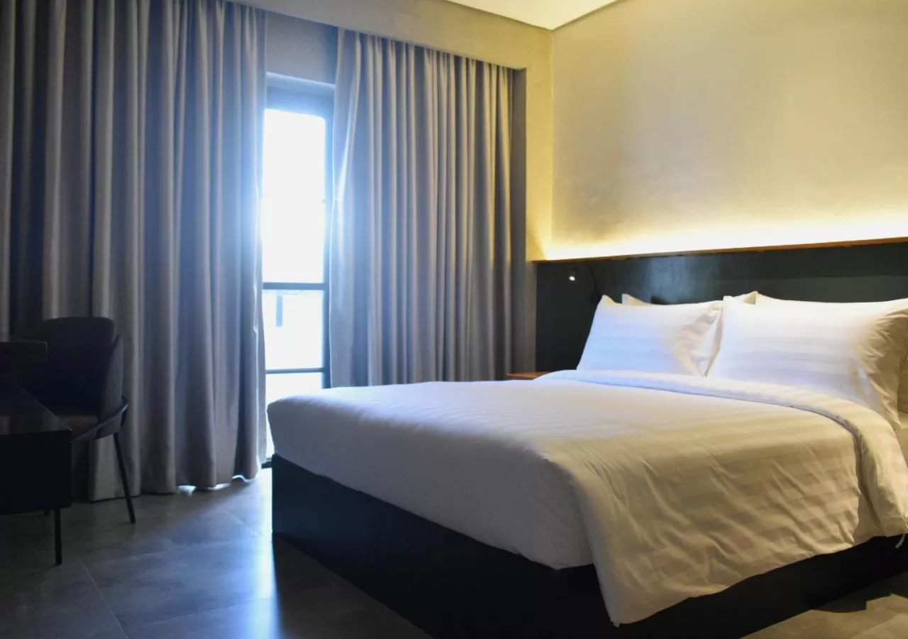 Bed in Venus Parkview Hotel