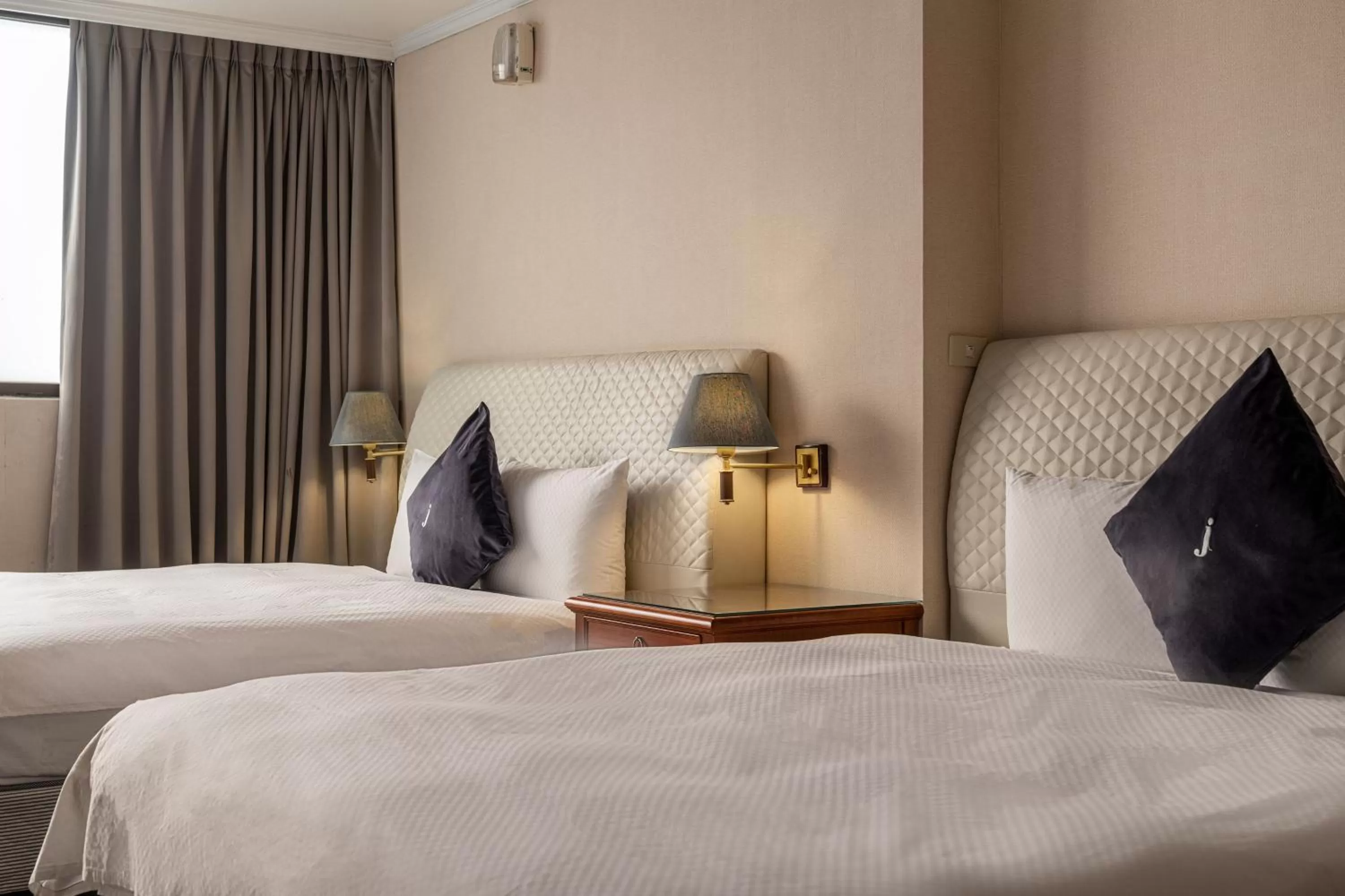 Bed in Hotel j-Metropolis