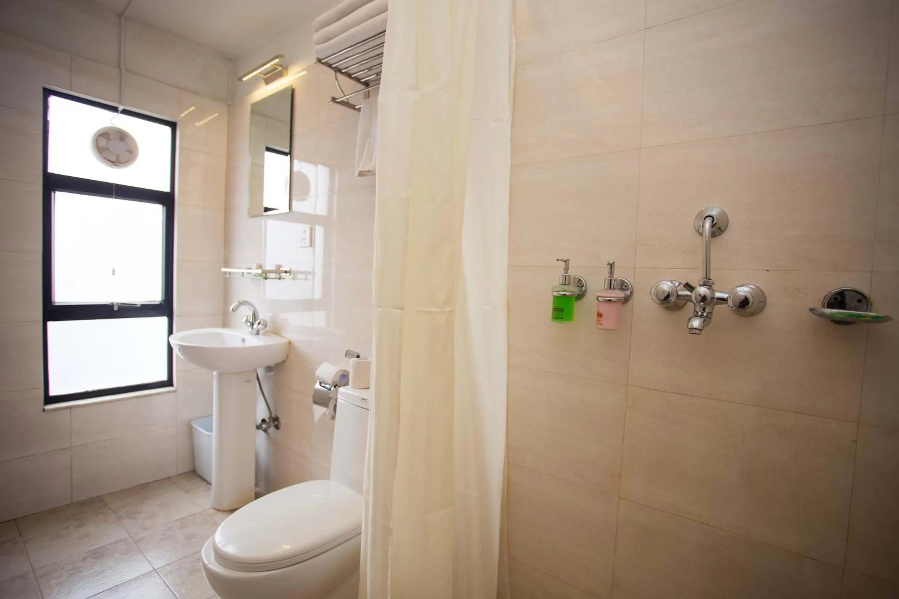 Bathroom in Hotel Jay Suites