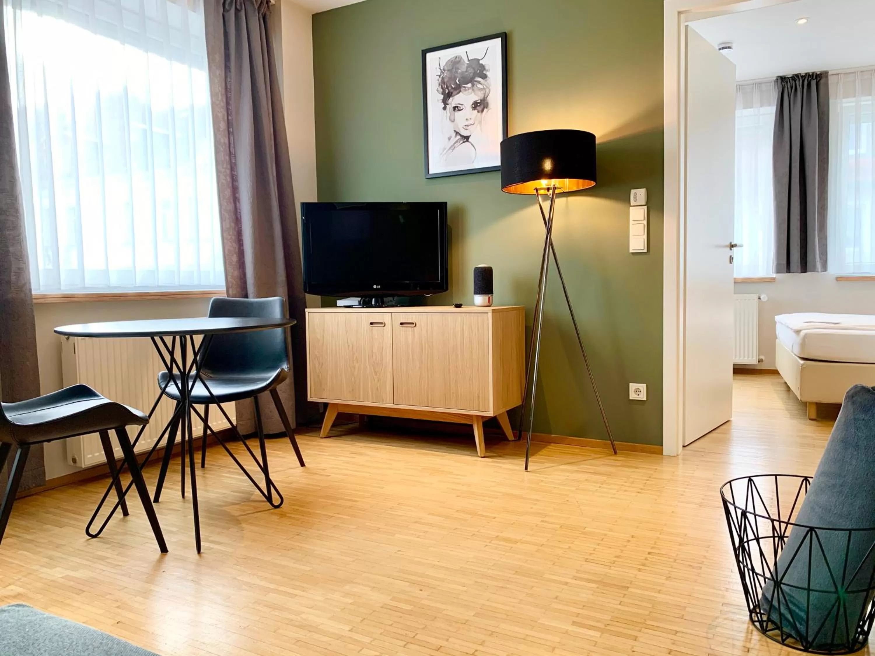 Living room, Bed in zeitwohnhaus SUITE-HOTEL & SERVICED APARTMENTS