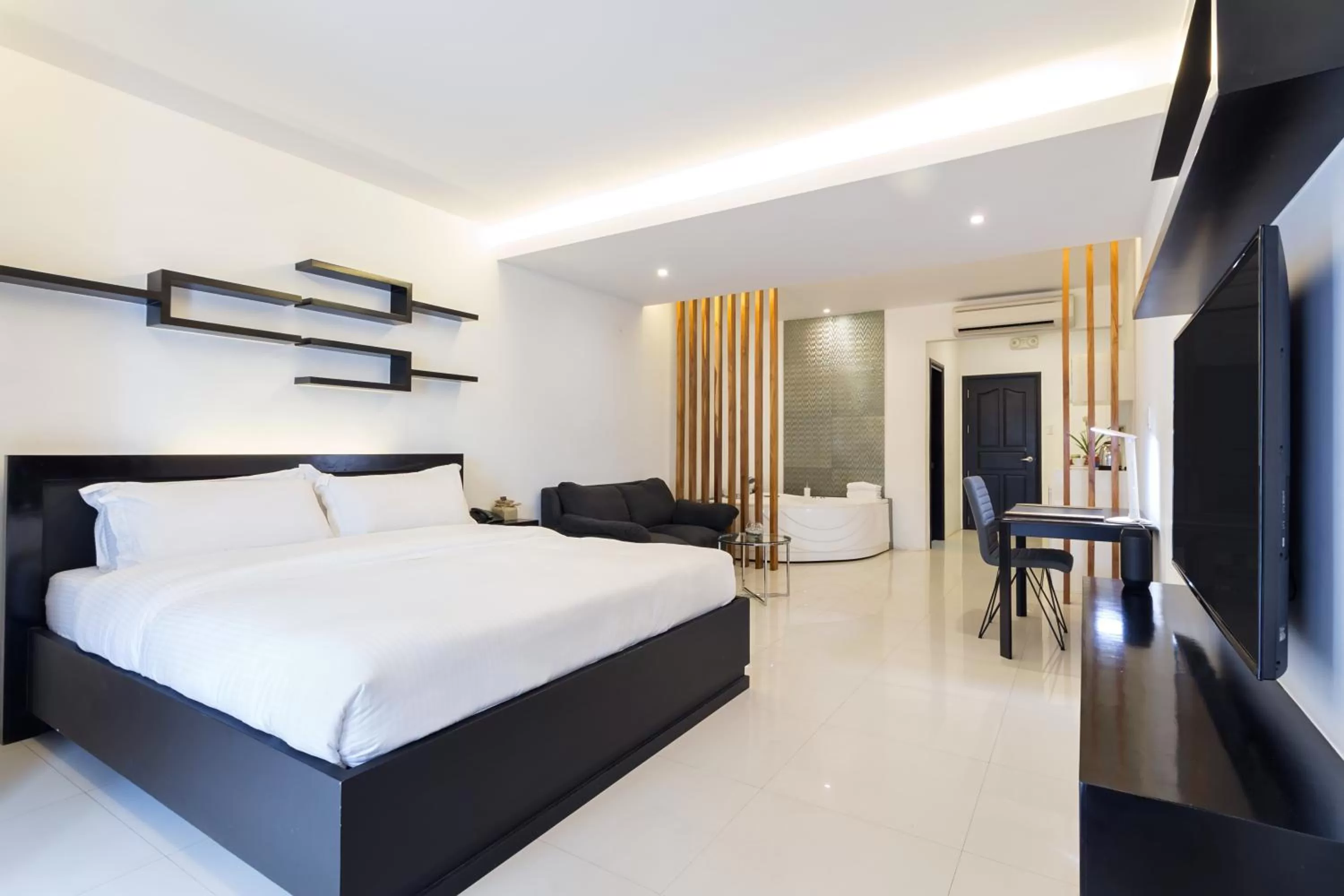 Photo of the whole room, Bed in Winds Boutique Hotel