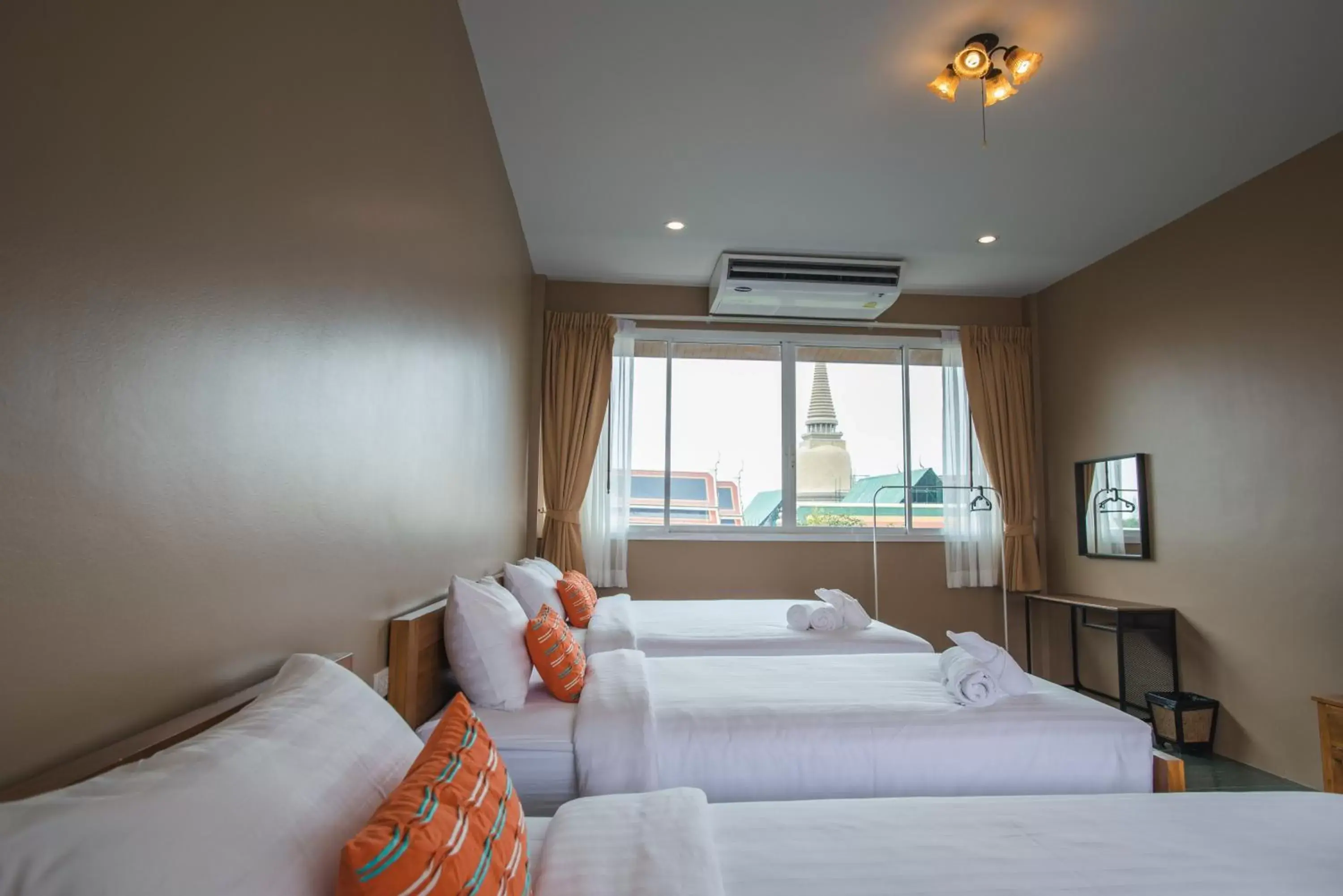 Family Room with Shared Bathroom in Feung Nakorn Balcony Rooms and Cafe Family Room with Shared Bathroom in Feung Nakorn Balcony Rooms and Cafe