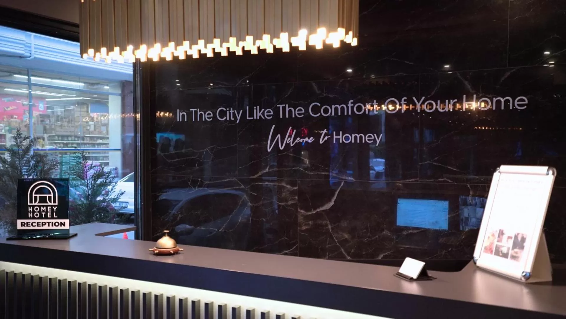 Property logo or sign in Homey AirPort Hotel