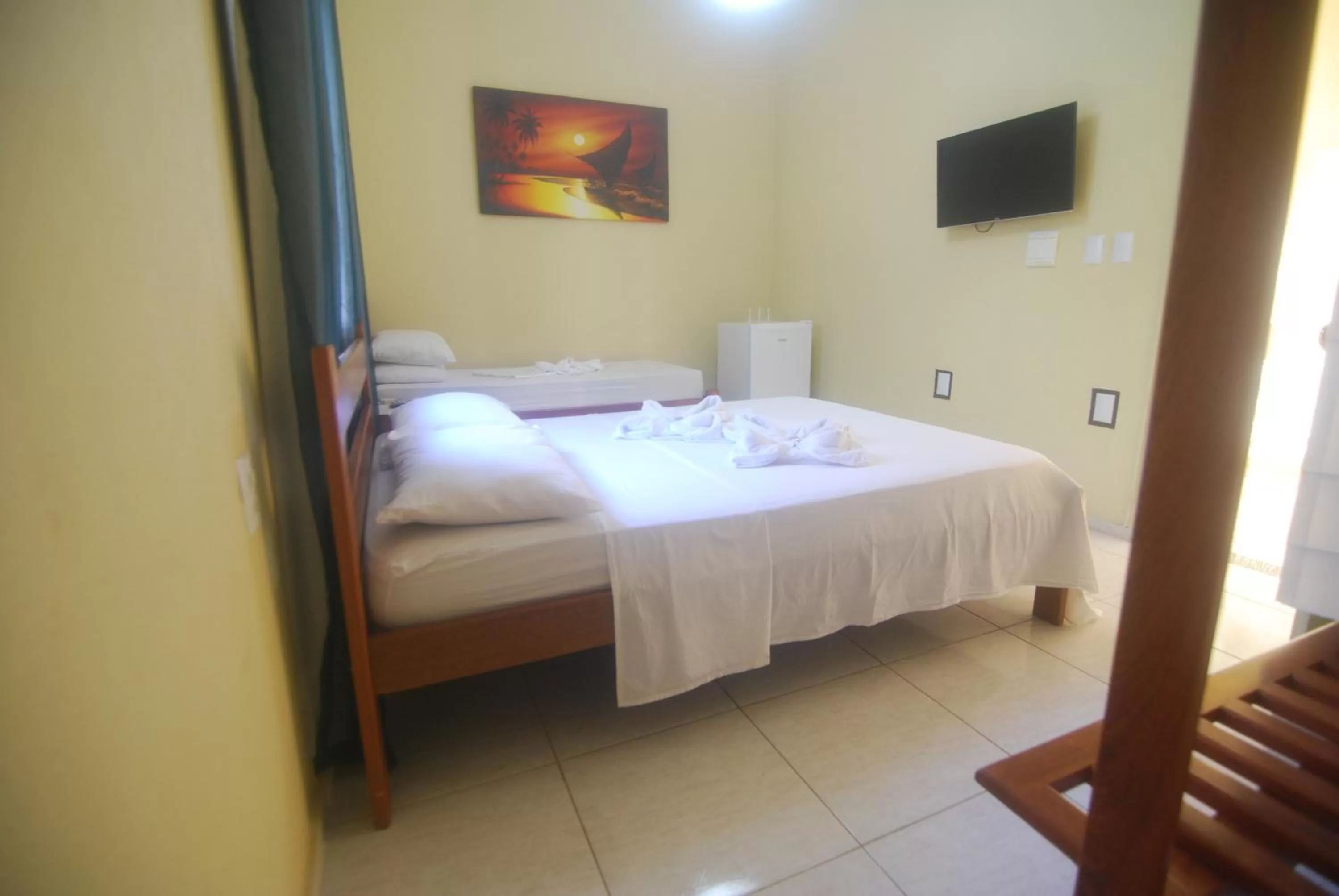 Bed in Refúgio Pousada Fortaleza