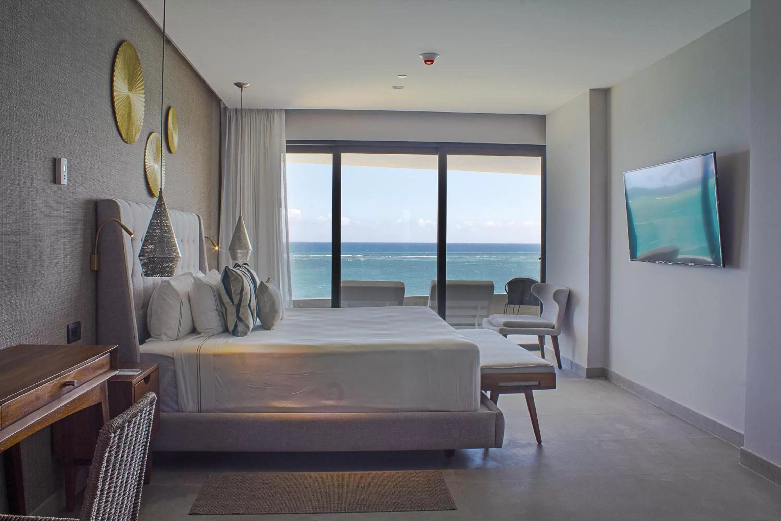 Photo of the whole room, Bed in The Fives Oceanfront