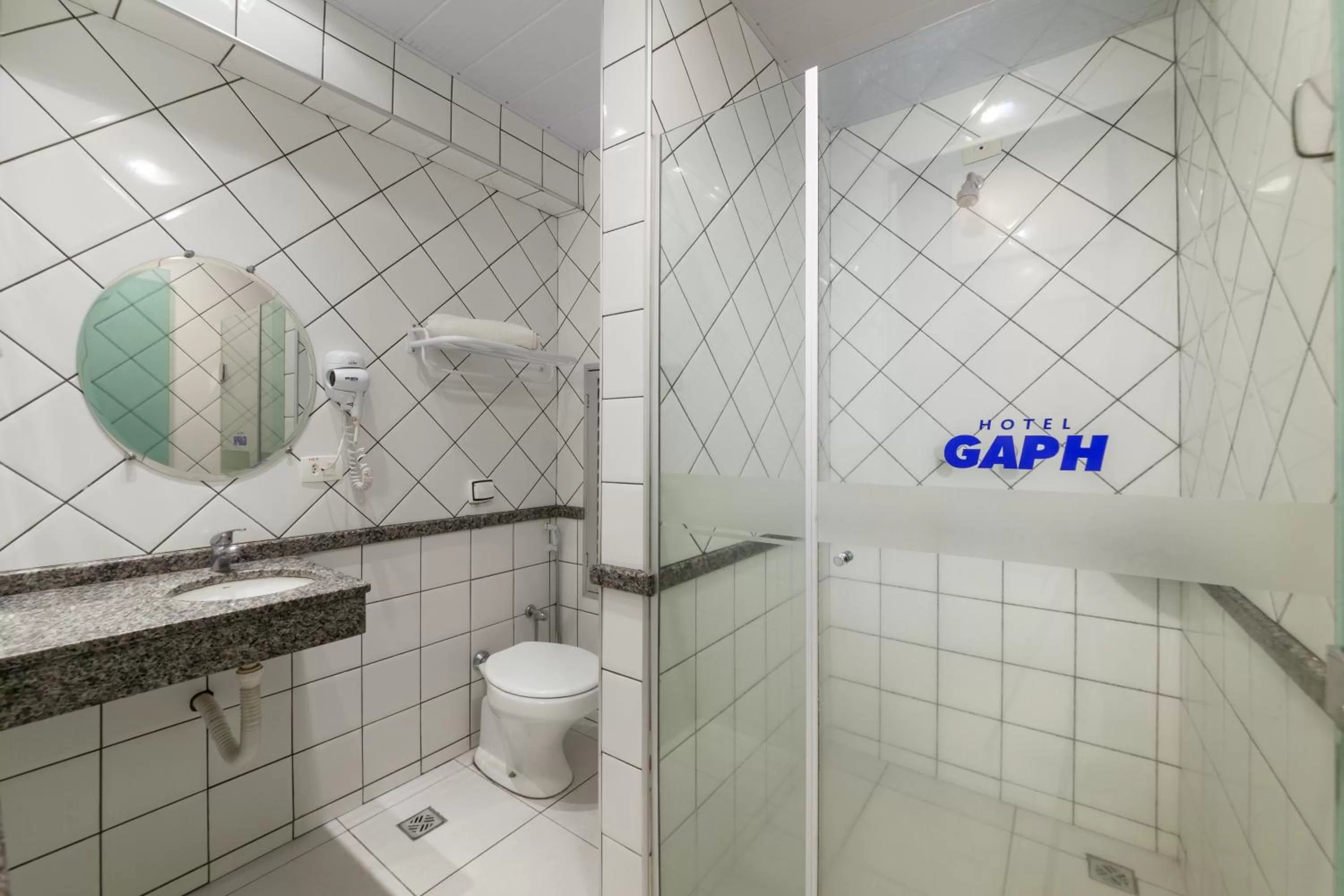 Bathroom in Hotel GAPH Maringa - Economico Mini Resort