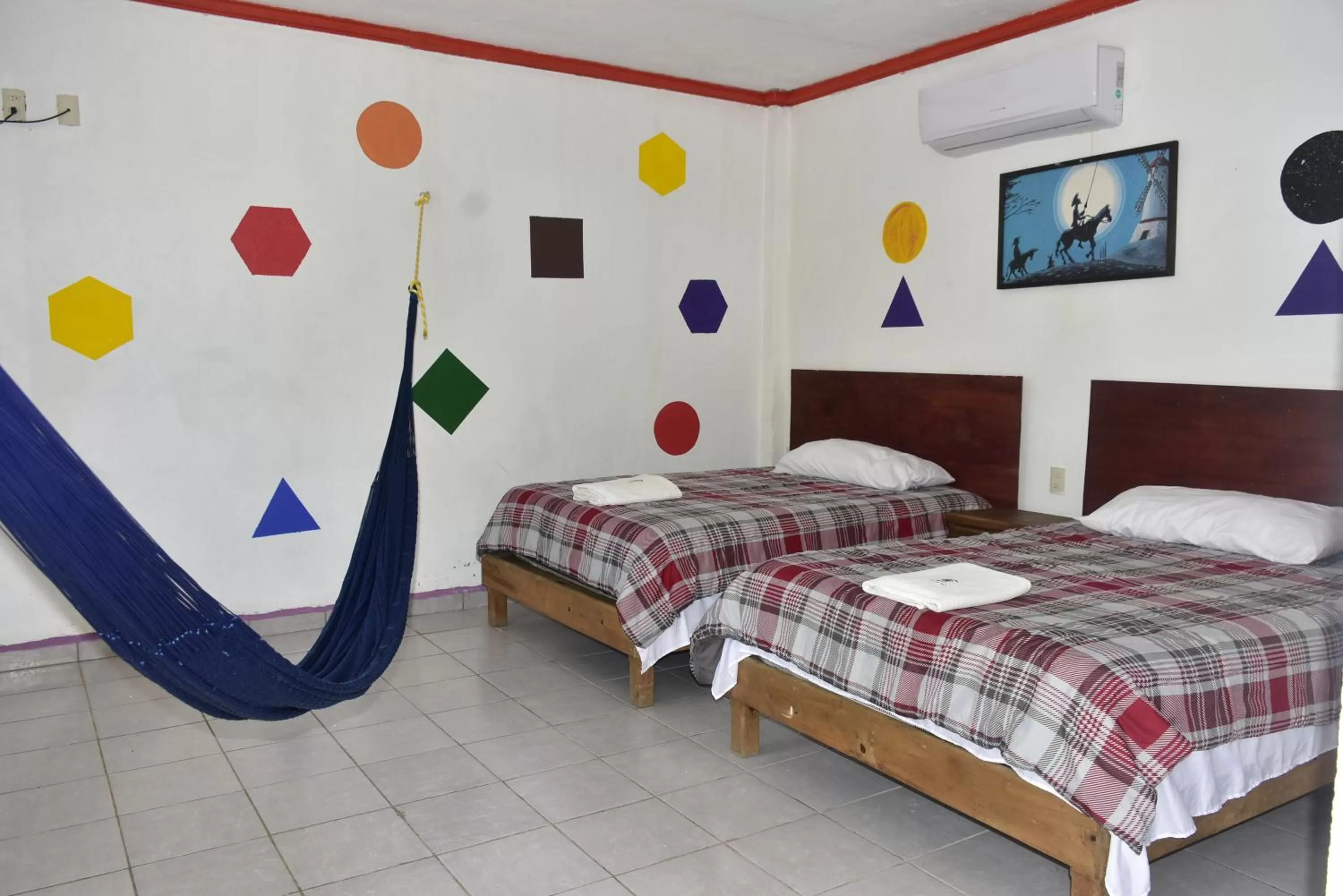 Bed in Hotel Bacaanda