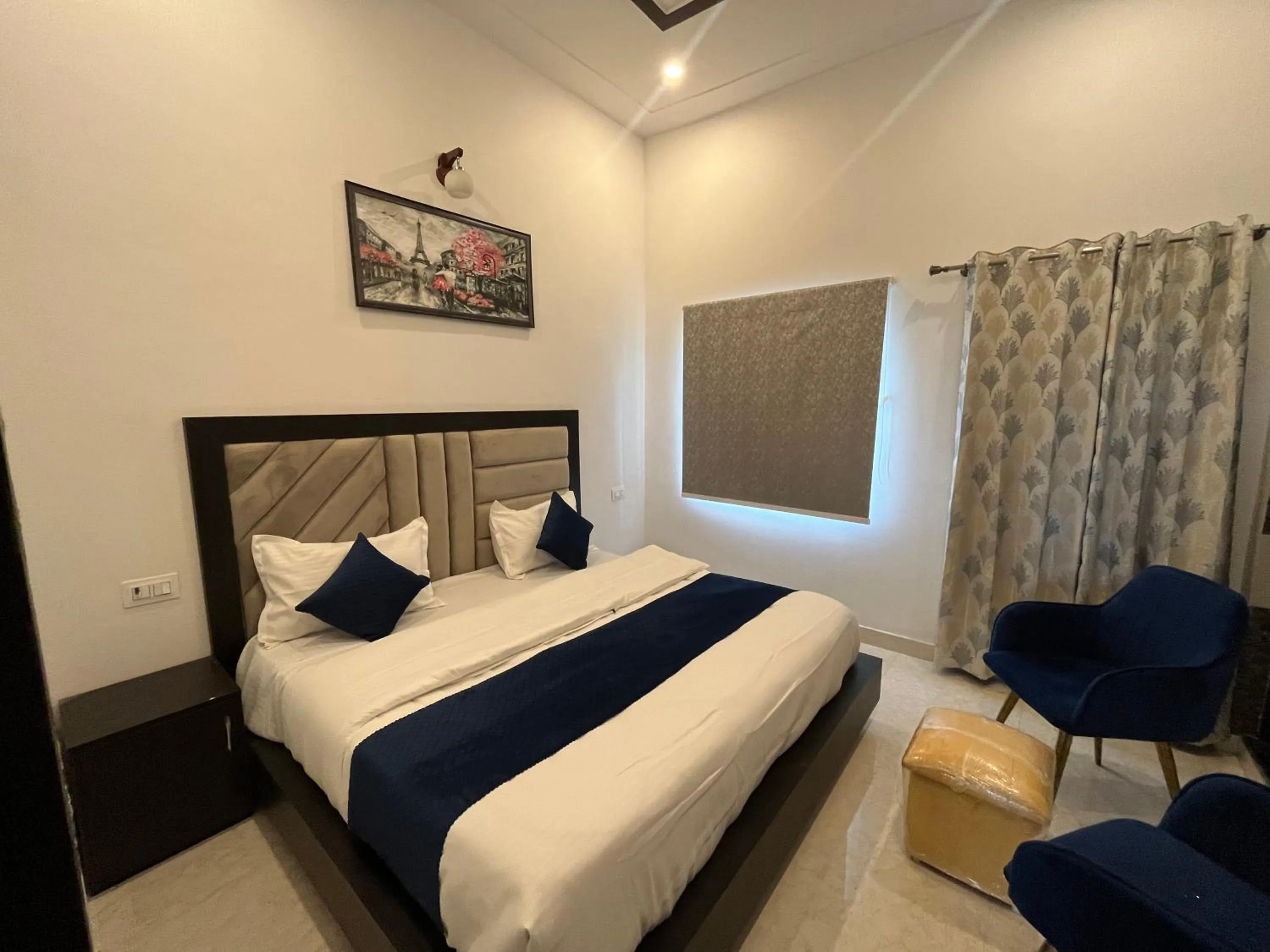 Bed in The nines hotel & restro