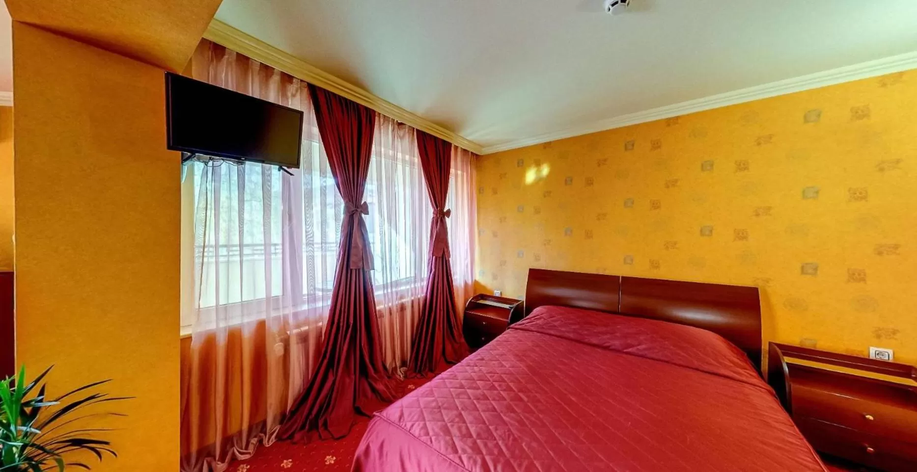 Bed in Troyan Plaza Hotel