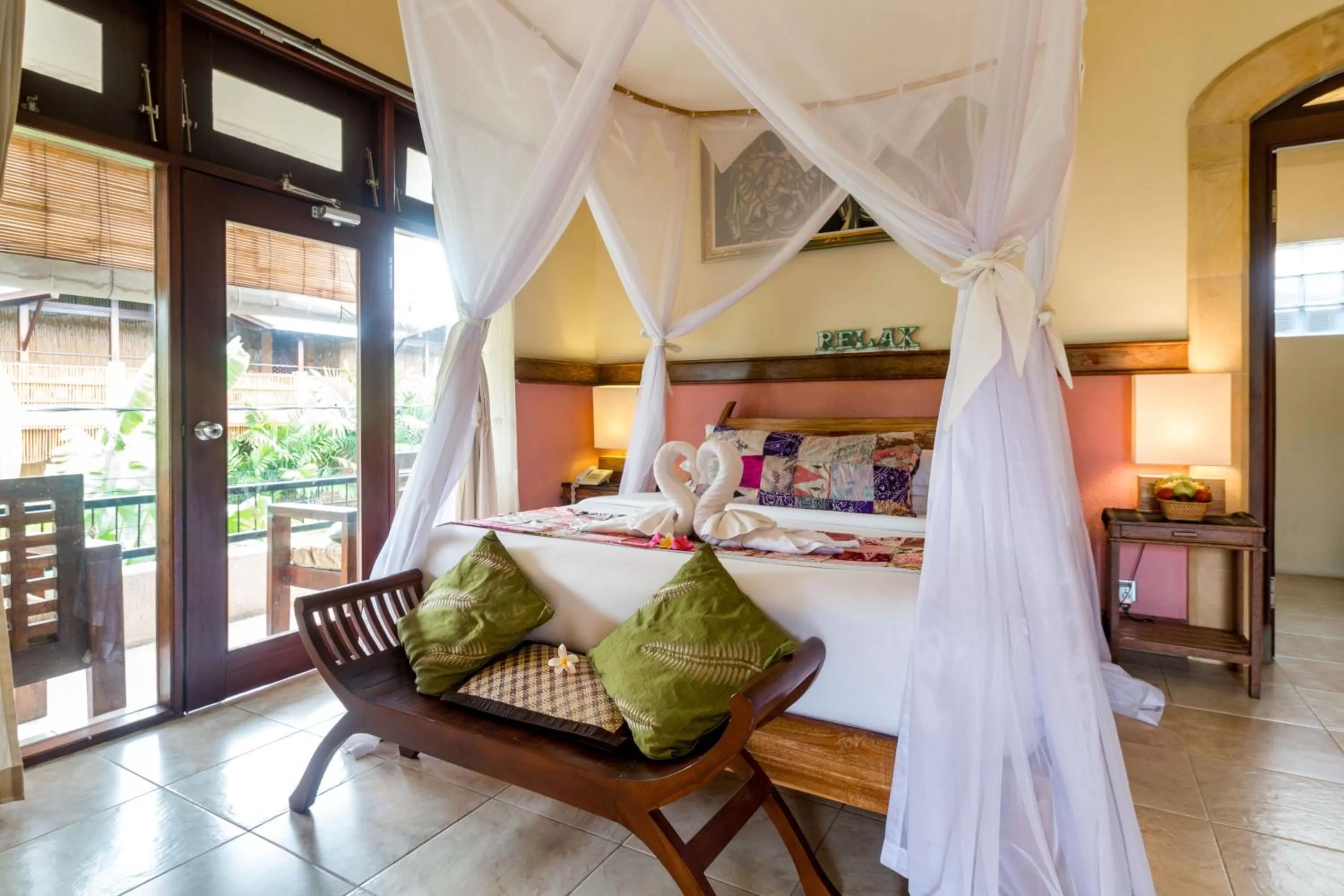 Photo of the whole room, Bed in Ubud Aura Retreat