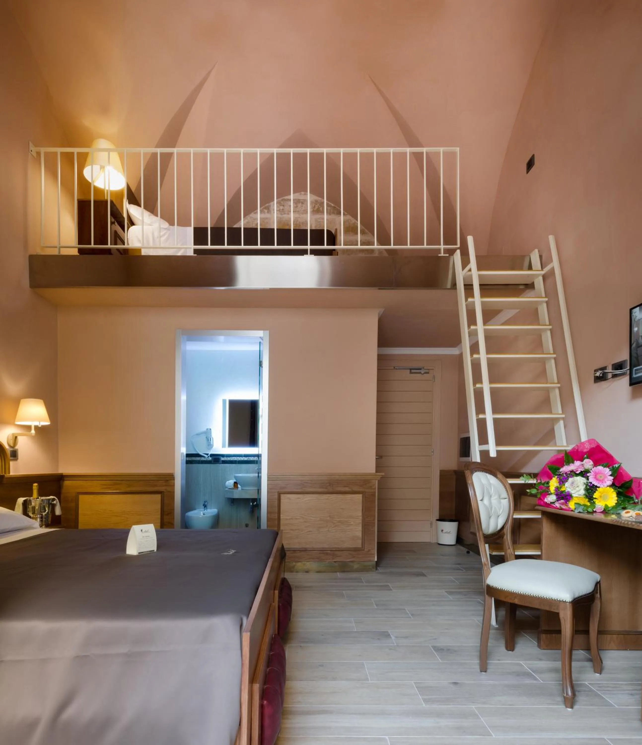 Bed in Le Club Boutique Hotel