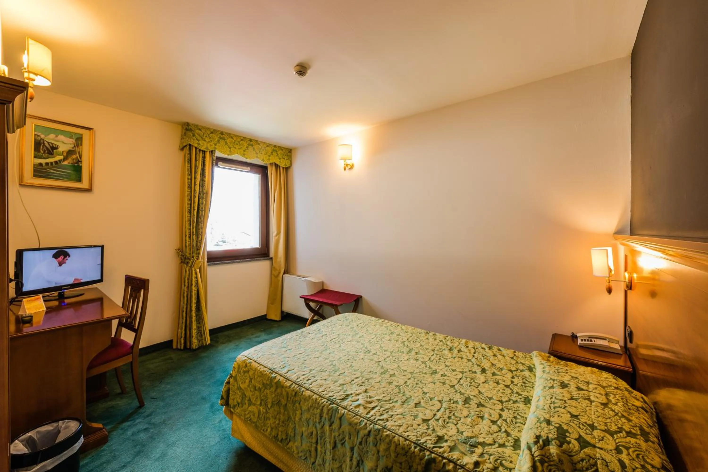 Bed in Hotel Au Soleil