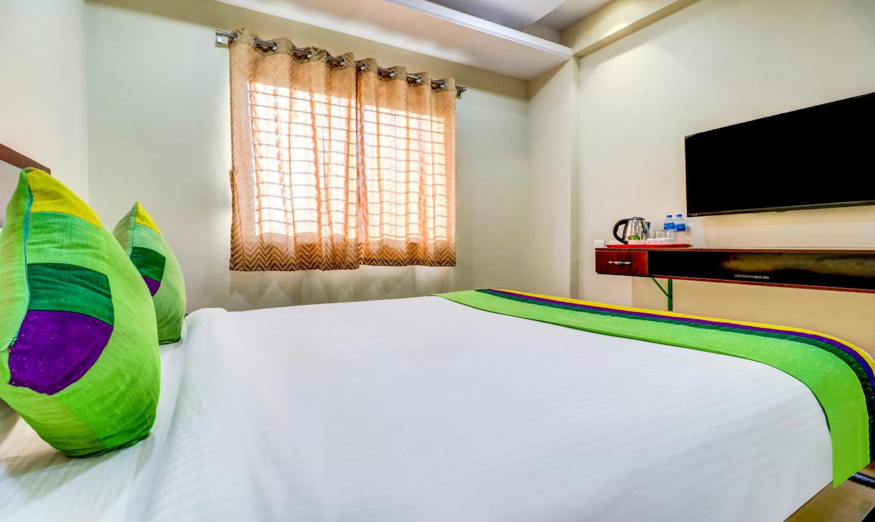 Bedroom, Bed in Treebo Grand Milan