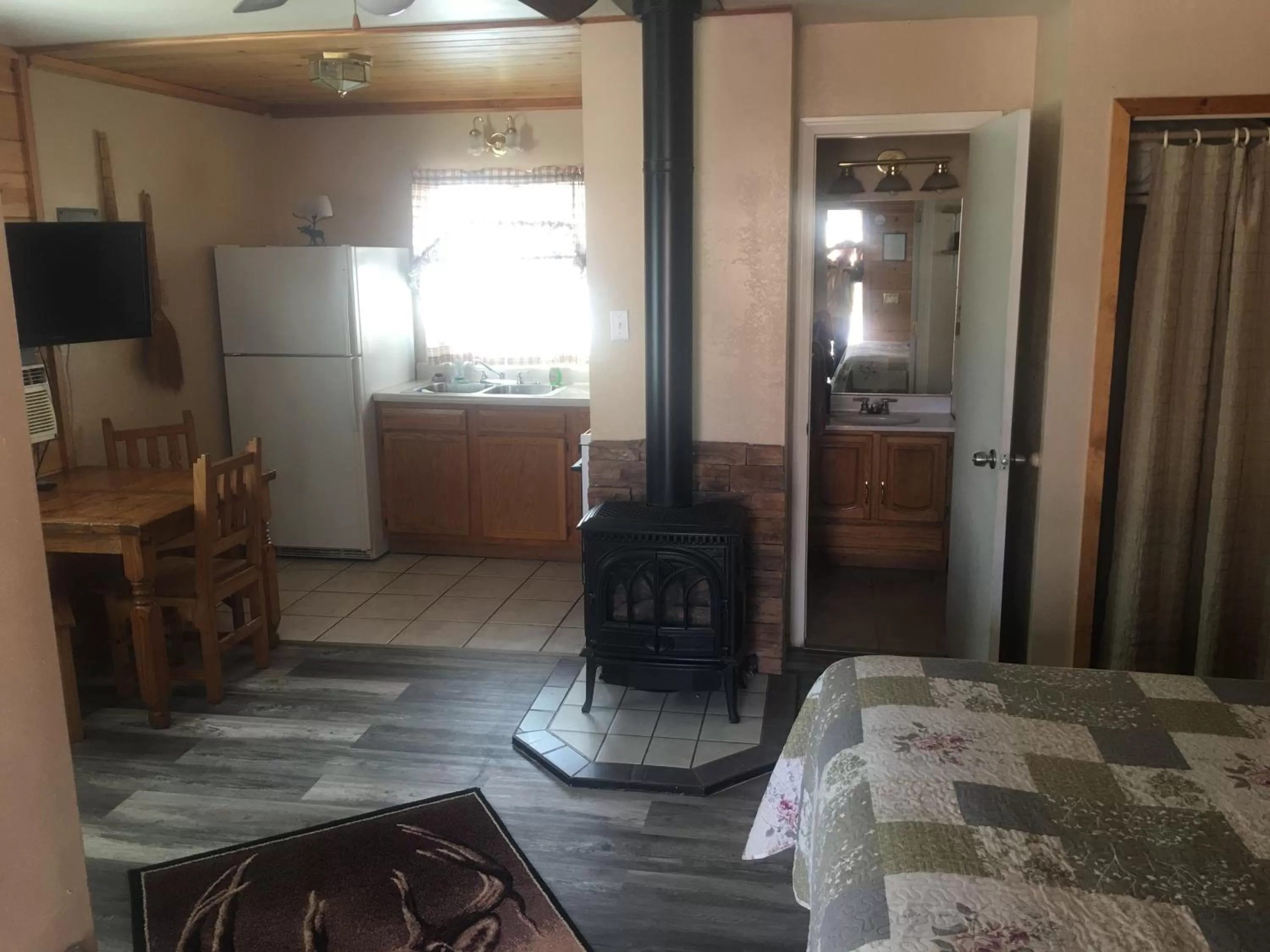 Photo of the whole room, Bed in Rainbows End Fishing Resort