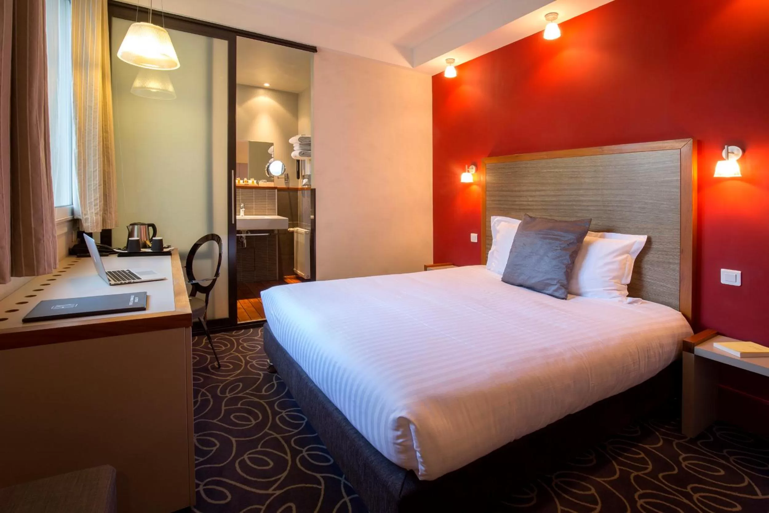 Photo of the whole room, Bed in Hôtel de Normandie