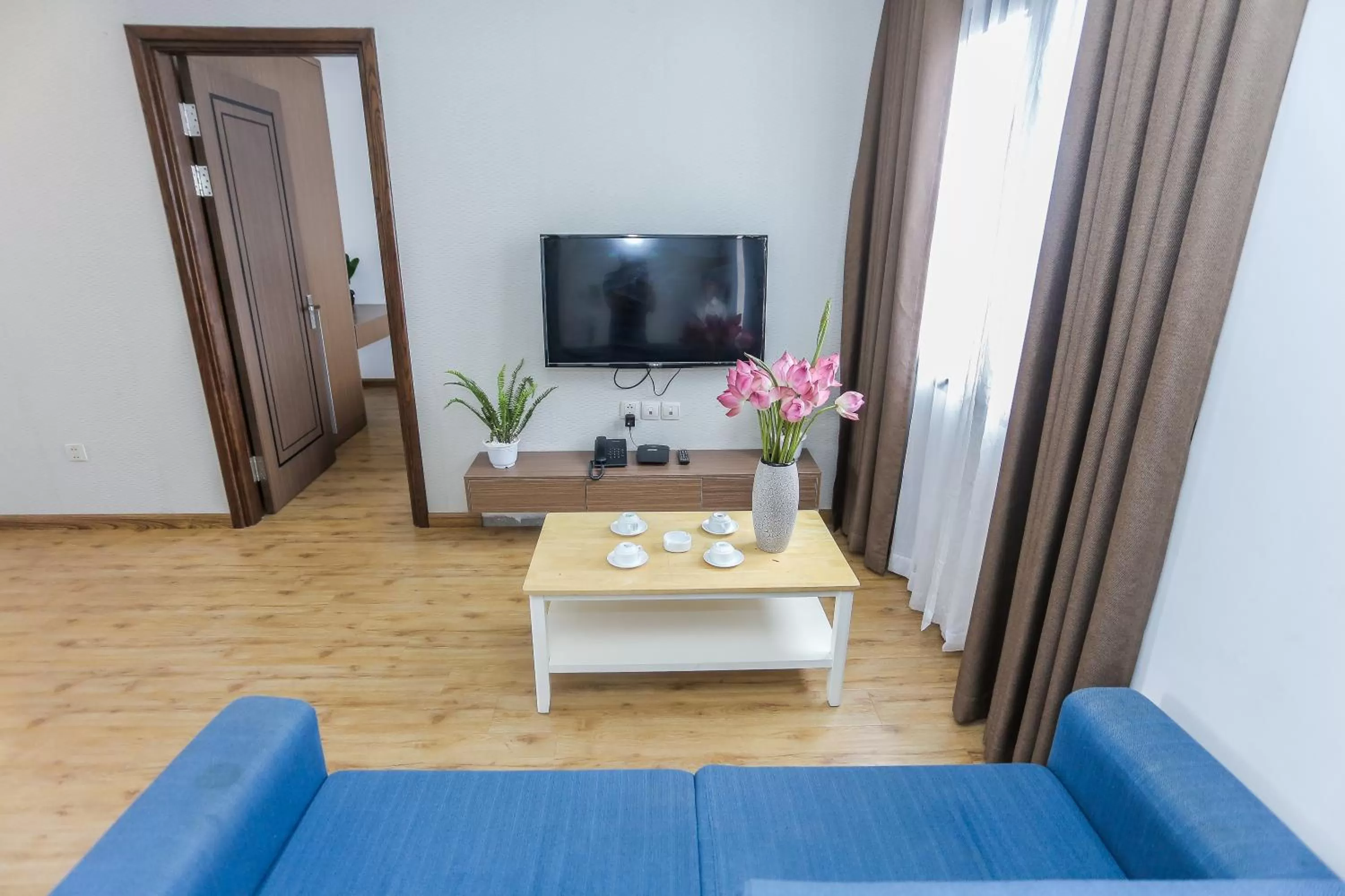 Living room in HNC Premier Hotel & Residences