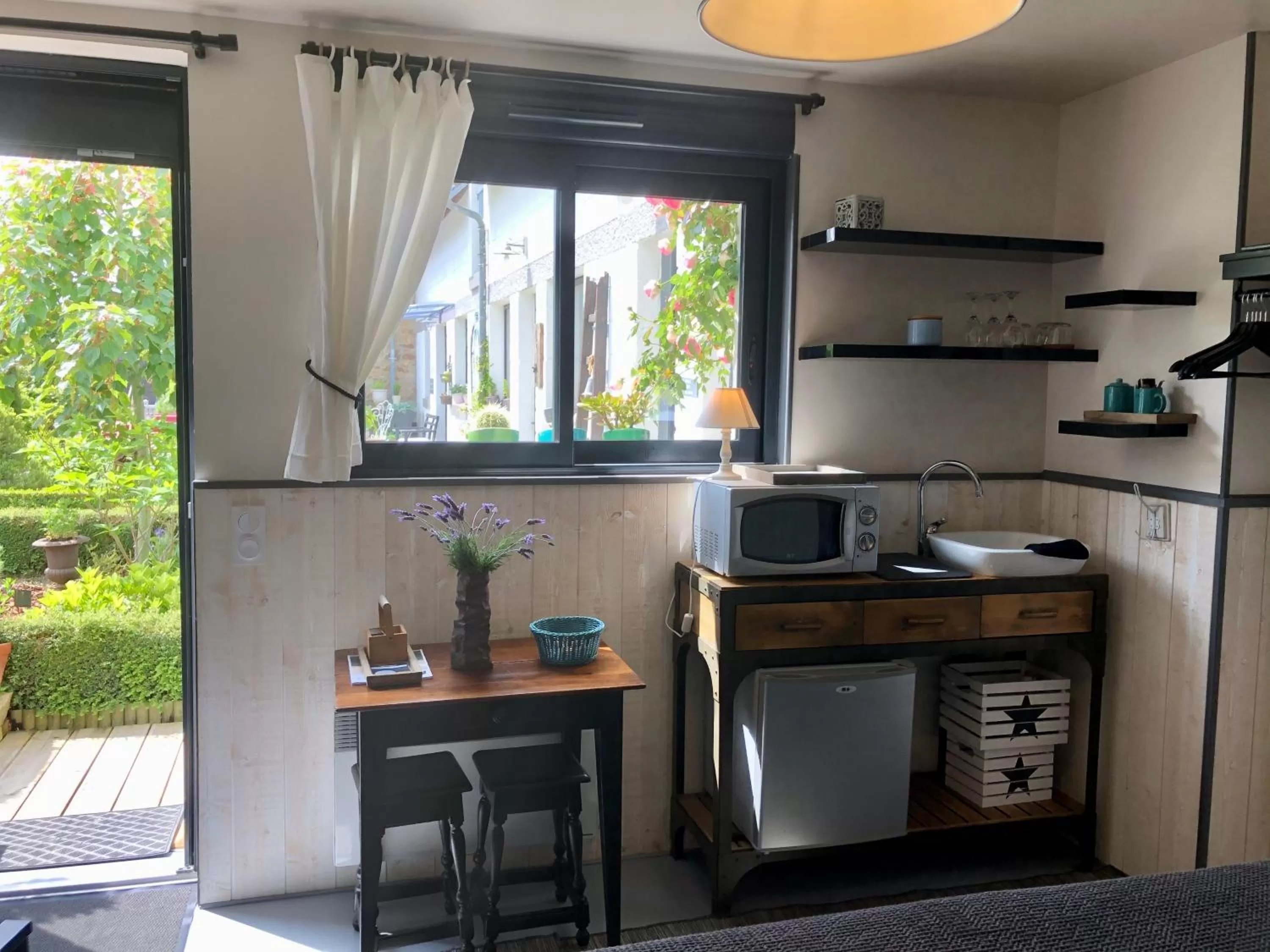 Kitchen or kitchenette in Le Grenier du Jardin