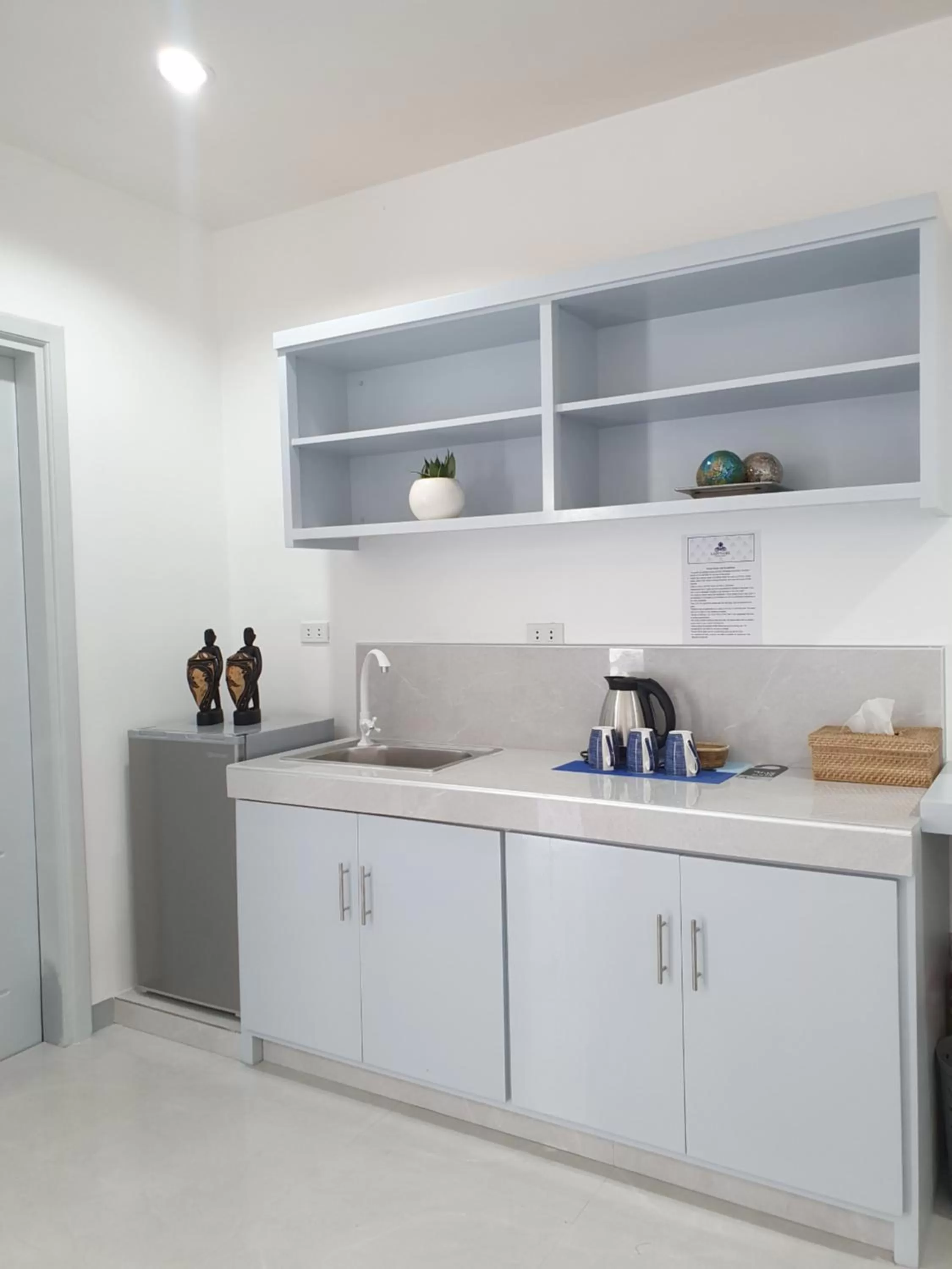 Kitchen or kitchenette in Sapphire Boutique Resort