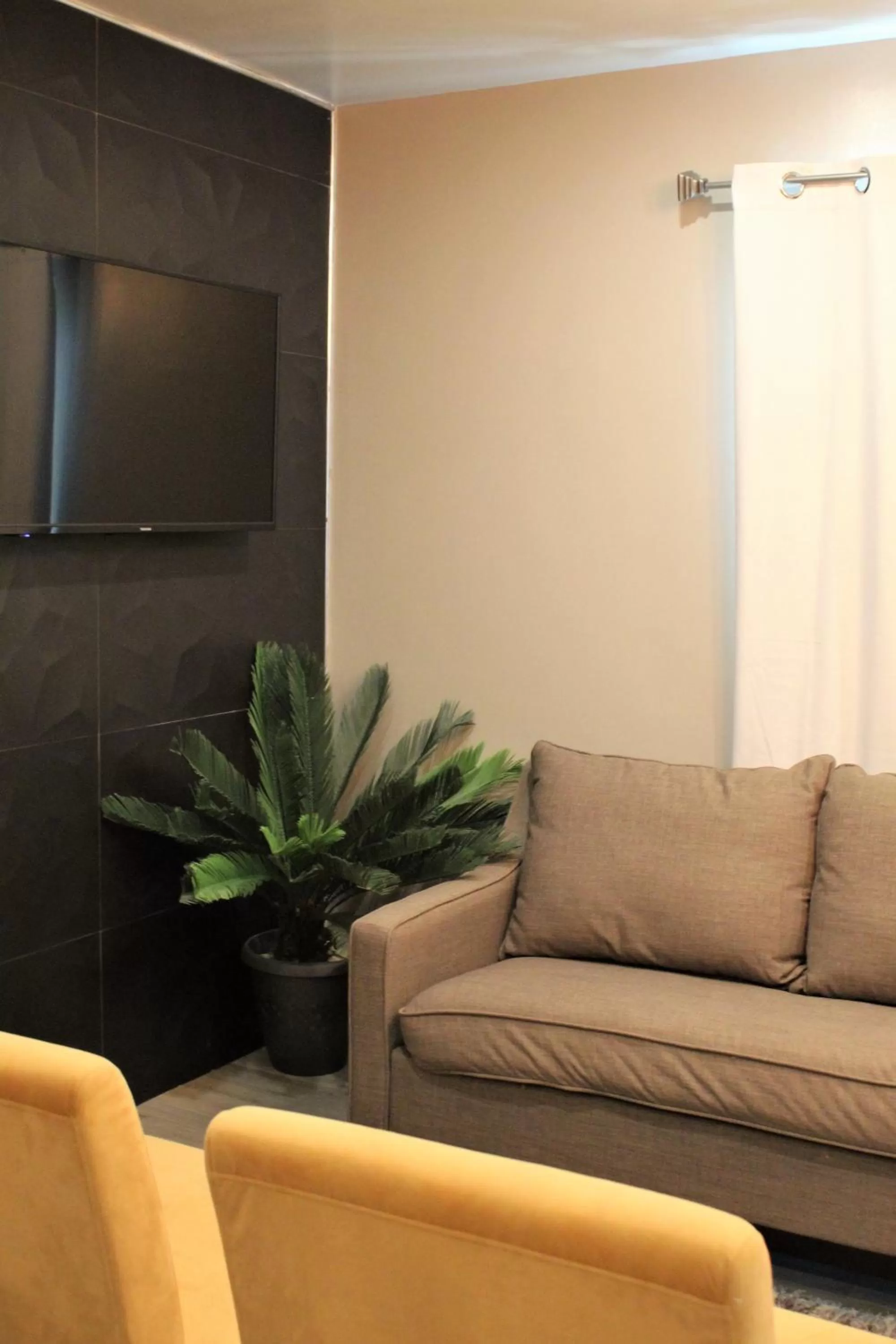 Seating area in Barefoot Caye Caulker Hotel