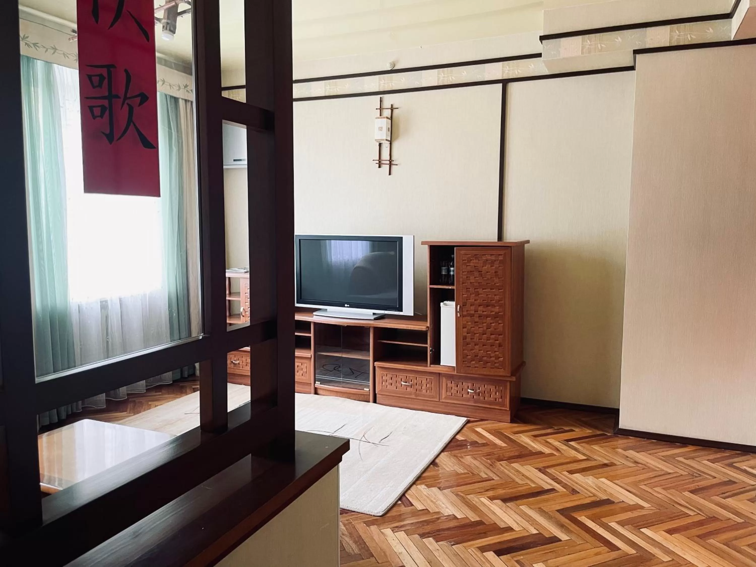 TV/Entertainment Center in Hotel Prydesnyansky