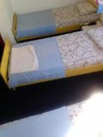 Bed in Sunrise Hotel