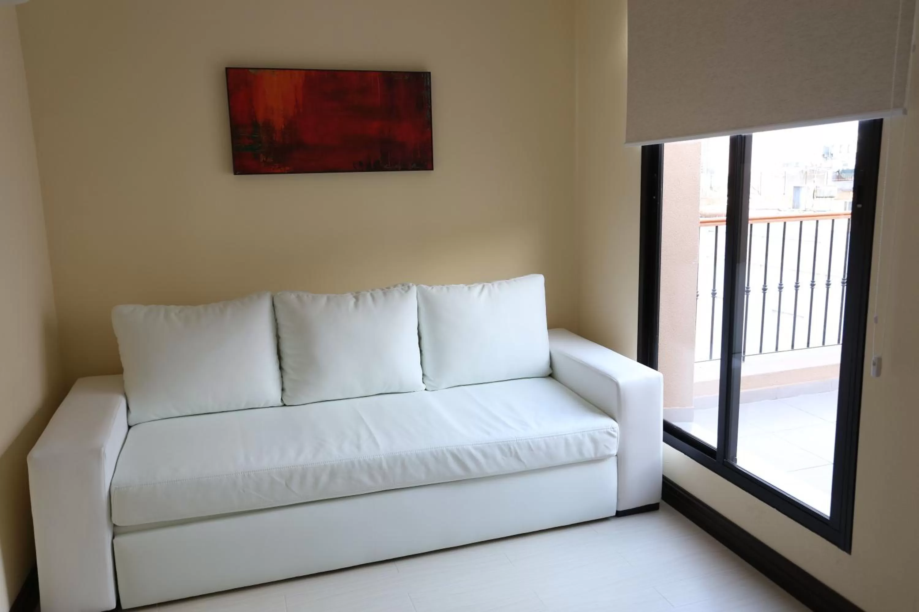 Living room, Bed in Puerto Mercado Hotel
