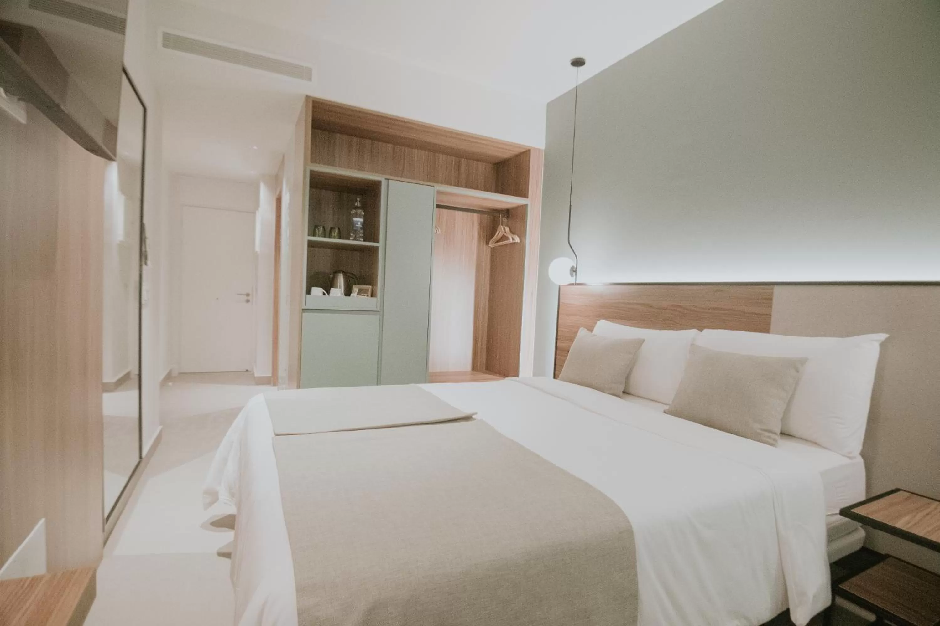 Bed in Catalina Plaza Hotel Sostenible