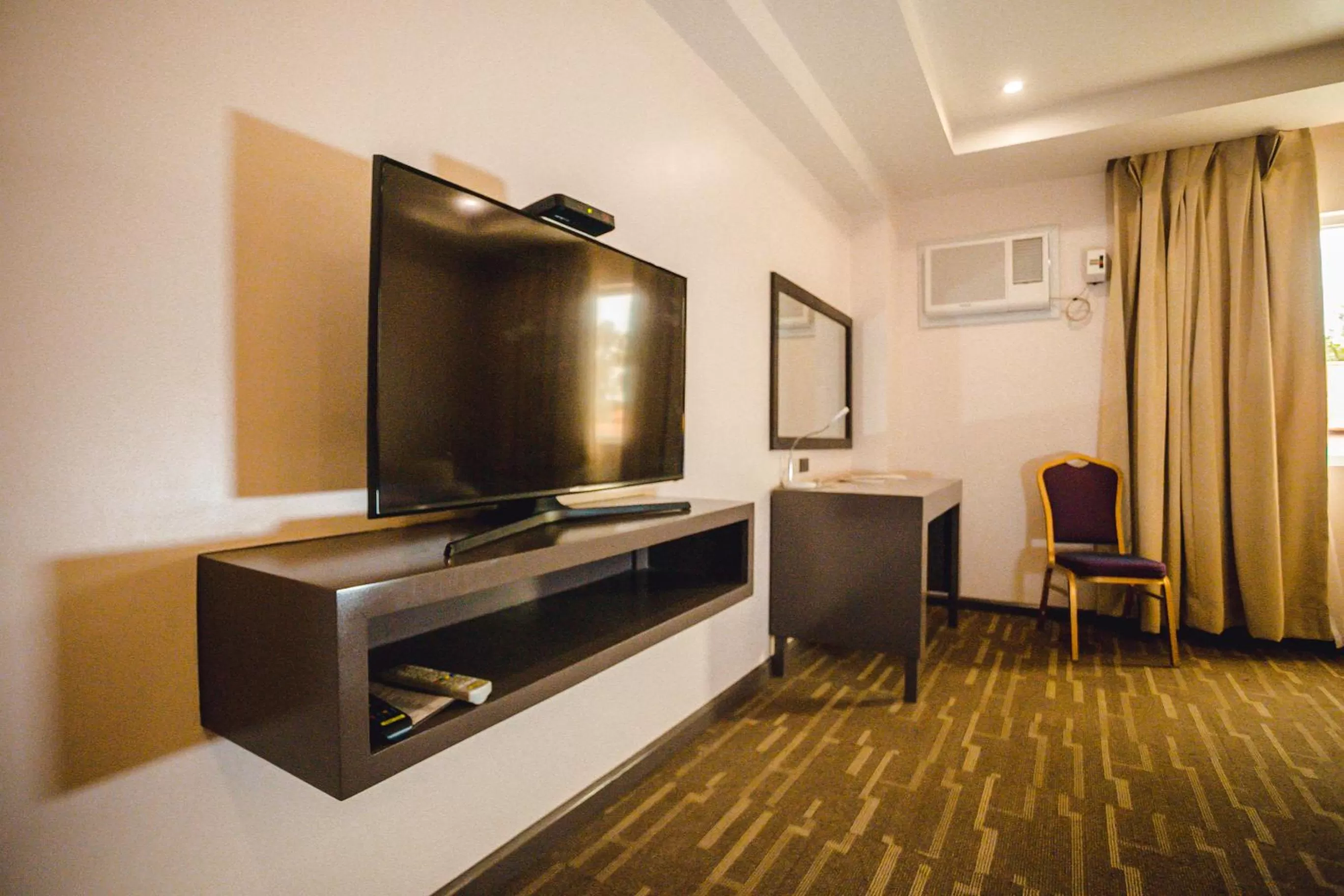 Living room, TV/Entertainment Center in Butuan Grand Palace Hotel