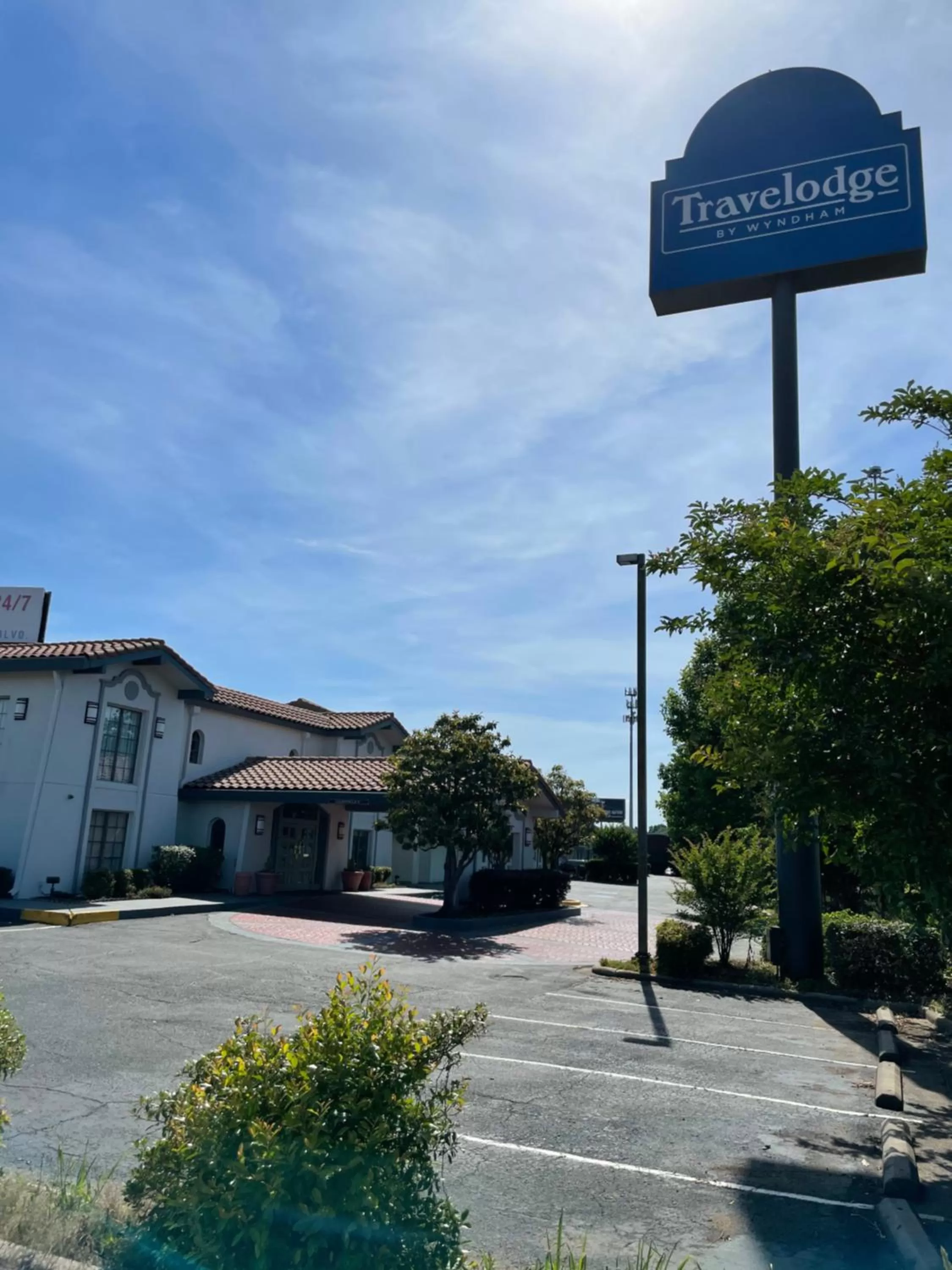 Property logo or sign in Travelodge by Wyndham Tuscaloosa